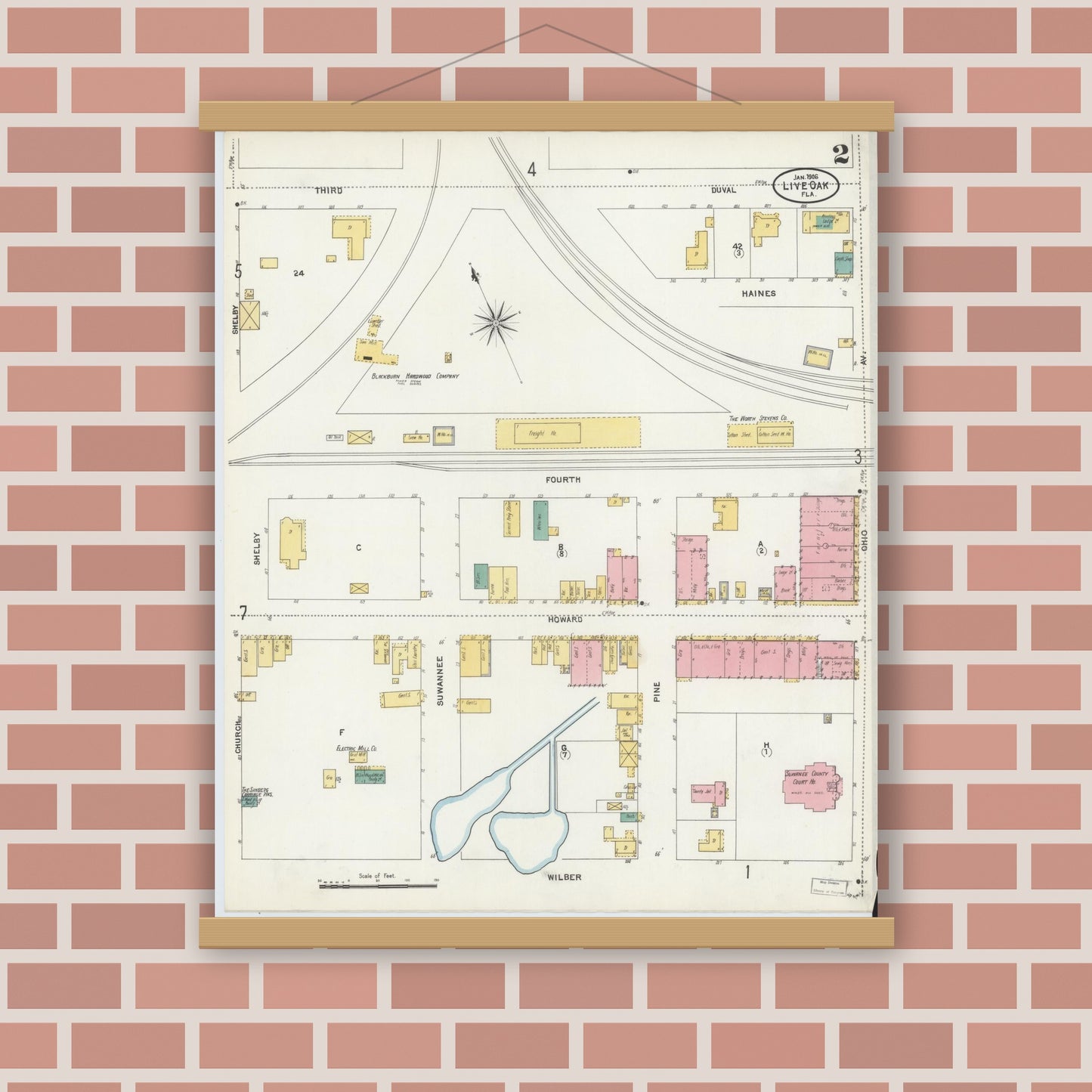 Old map wall art mockup — magnetic wood frame on brick wall — Sanborn Fire Insurance Map from Live Oak, Suwanee County, Florida (1906), Sheet #0002