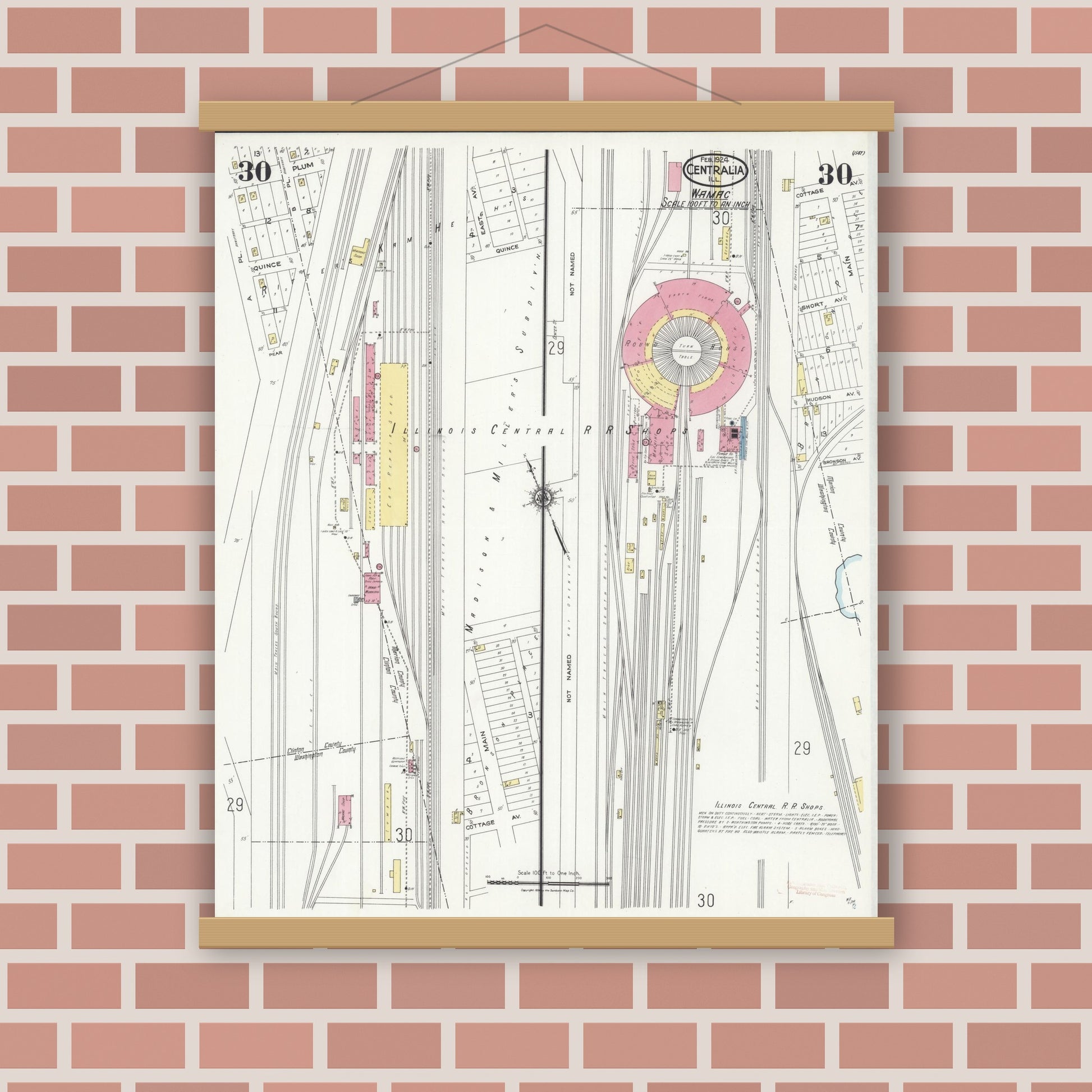 Old map wall art mockup — magnetic wood frame on brick wall — Sanborn Fire Insurance Map from Centralia, Marion, Clinton, Jefferson, and Washington Counties, Illinois (1924), Sheet #0030