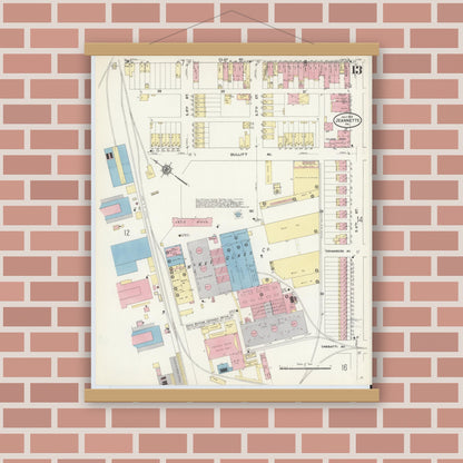 Old map wall art mockup — magnetic wood frame on brick wall — Sanborn Fire Insurance Map from Jeannette, Westmoreland County, Pennsylvania (1910), Sheet #0013