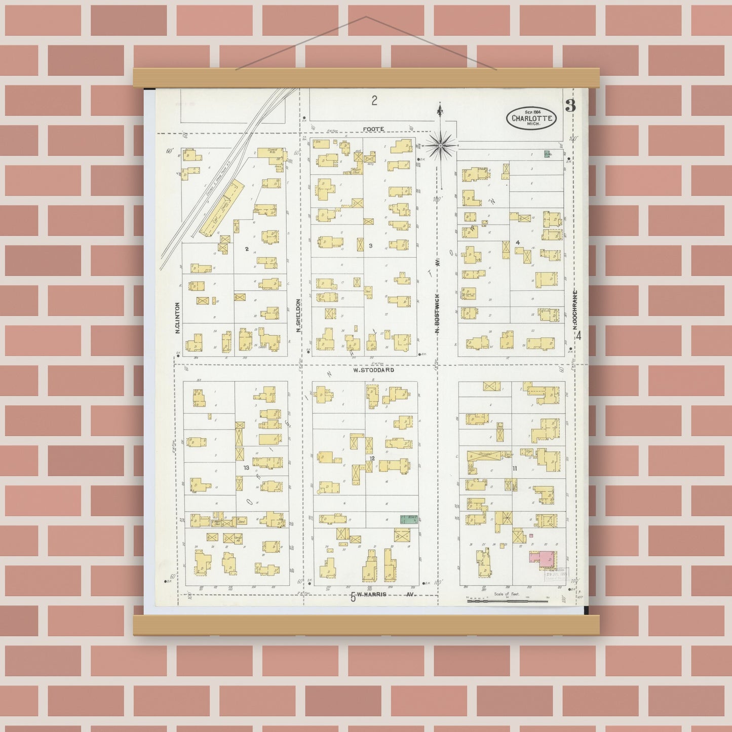 Old map wall art mockup — magnetic wood frame on brick wall — Sanborn Fire Insurance Map from Charlotte, Eaton County, Michigan (1904), Sheet #0003