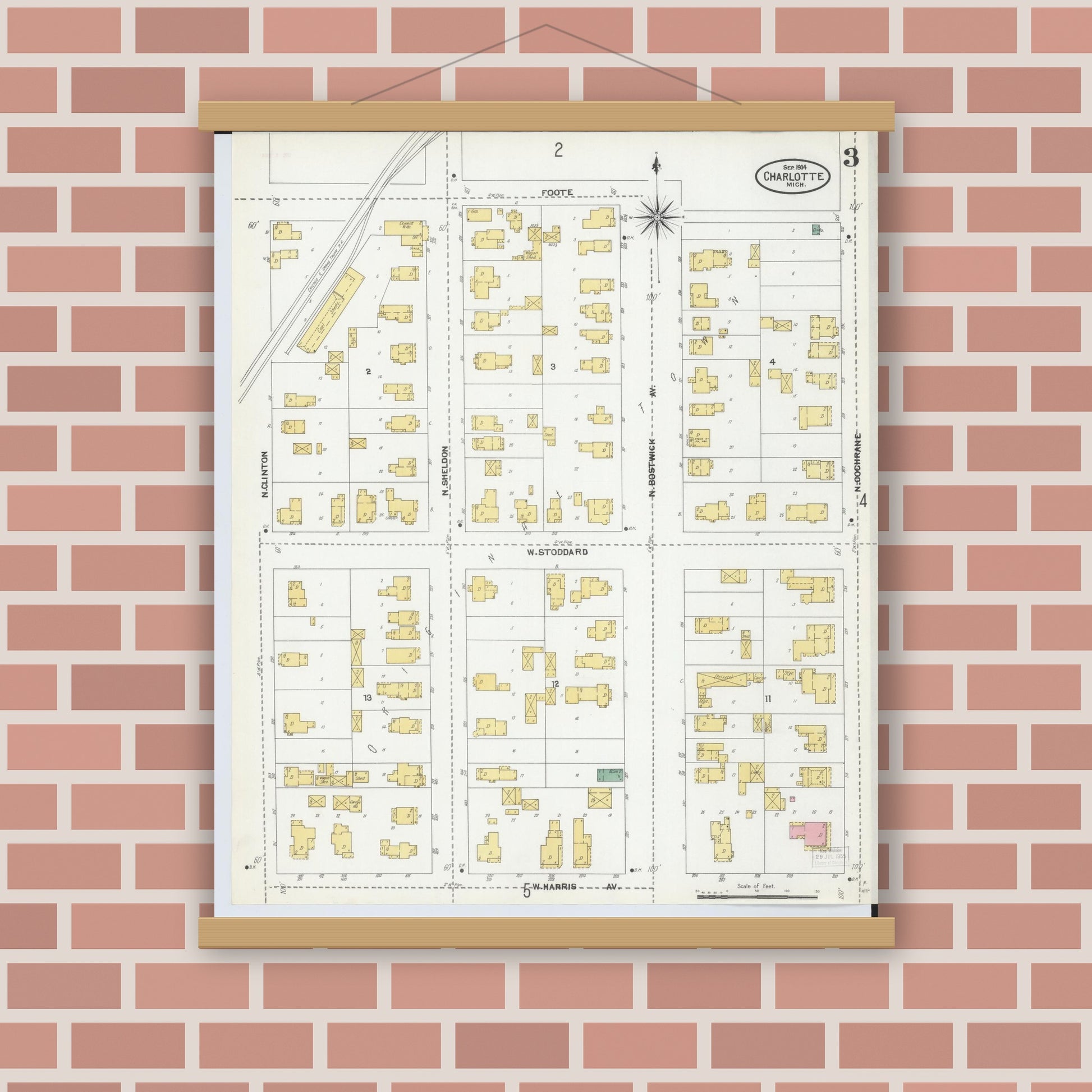 Old map wall art mockup — magnetic wood frame on brick wall — Sanborn Fire Insurance Map from Charlotte, Eaton County, Michigan (1904), Sheet #0003