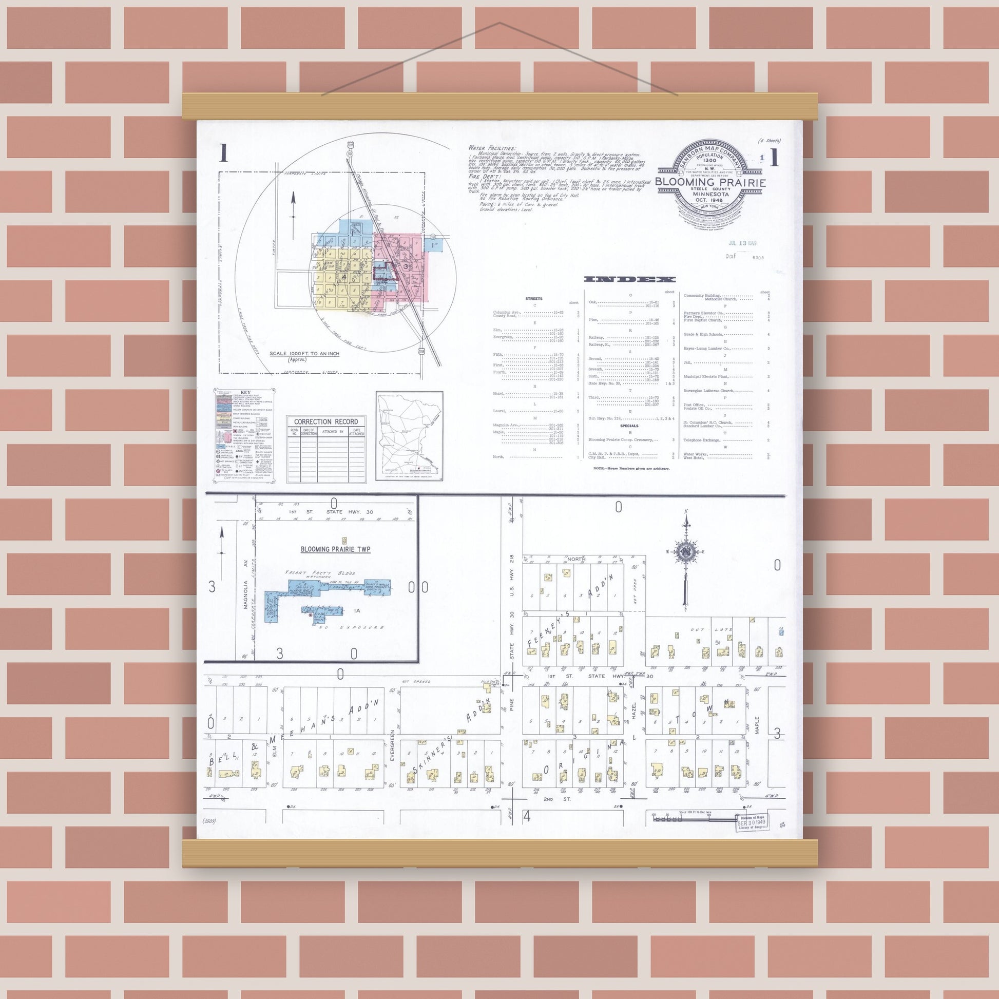 Old map wall art mockup — magnetic wood frame on brick wall — Sanborn Fire Insurance Map from Blooming Prairie, Steele County, Minnesota (1948), Sheet #0001