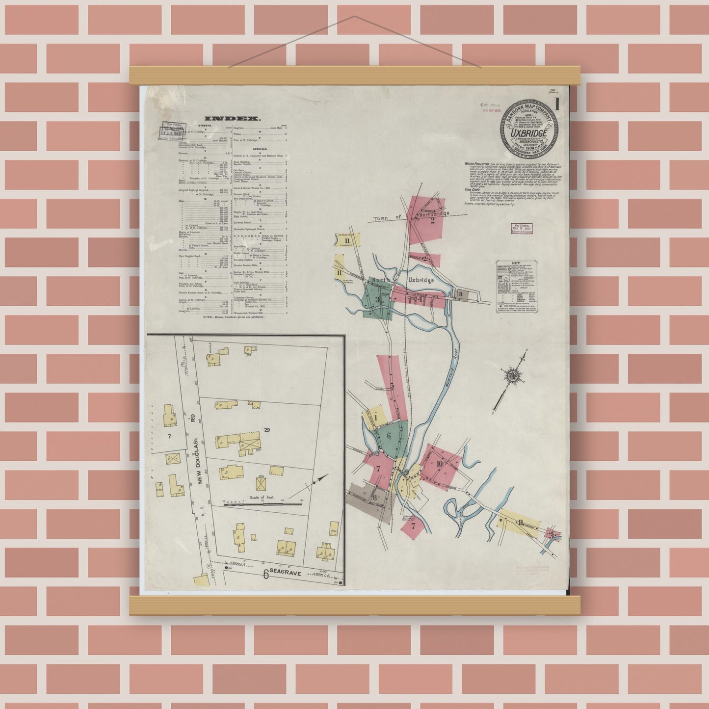 Old map wall art mockup — magnetic wood frame on brick wall — Sanborn Fire Insurance Map from Uxbridge, Worcester County, Massachusetts (1909), Sheet #0001