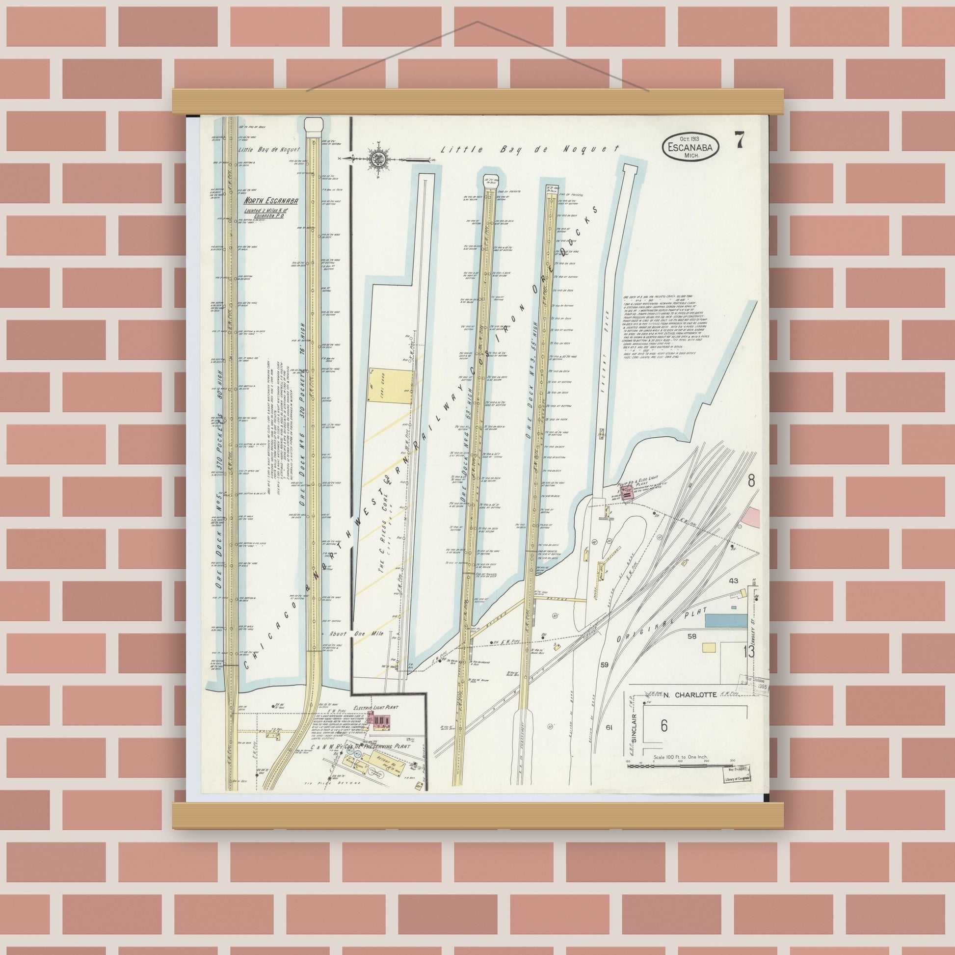 Old map wall art mockup — magnetic wood frame on brick wall — Sanborn Fire Insurance Map from Escanaba, Delta County, Michigan (1913), Sheet #0007