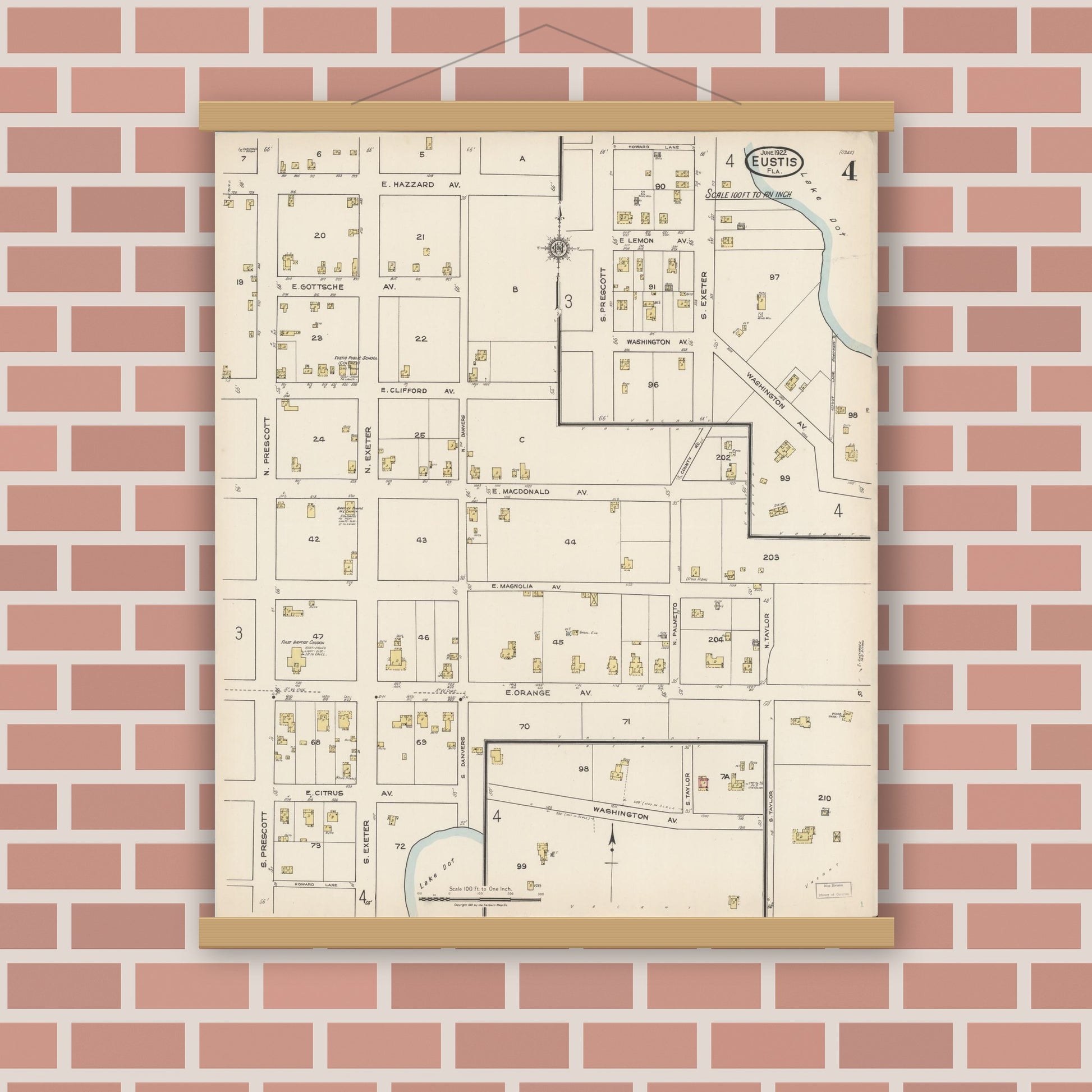 Old map wall art mockup — magnetic wood frame on brick wall — Sanborn Fire Insurance Map from Eustis, Lake County, Florida (1922), Sheet #0004