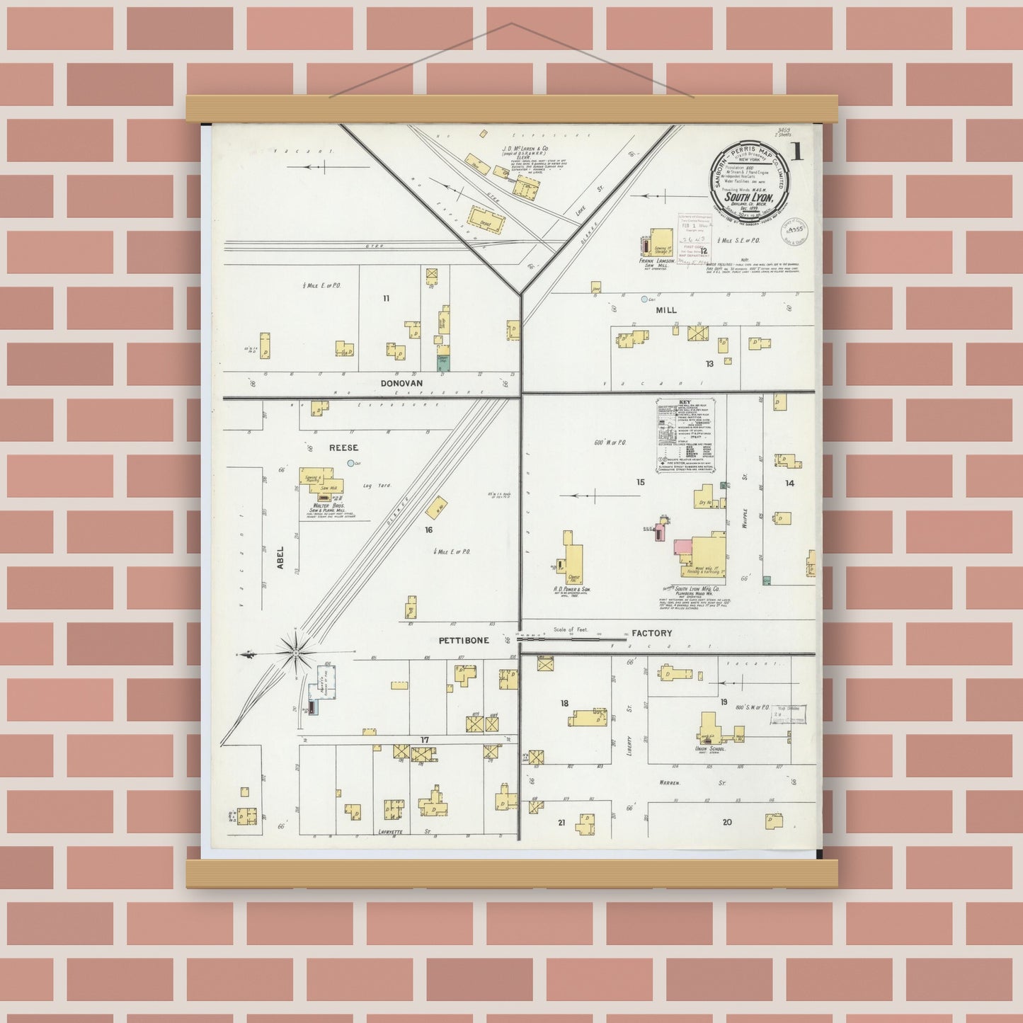 Old map wall art mockup — magnetic wood frame on brick wall — Sanborn Fire Insurance Map from South Lyon, Oakland County, Michigan (1899), Sheet #0001