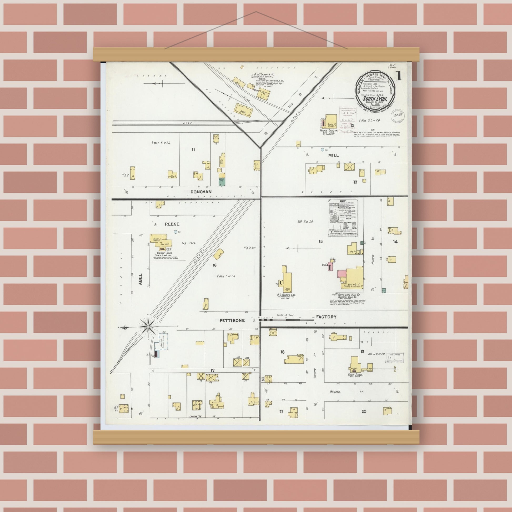 Old map wall art mockup — magnetic wood frame on brick wall — Sanborn Fire Insurance Map from South Lyon, Oakland County, Michigan (1899), Sheet #0001