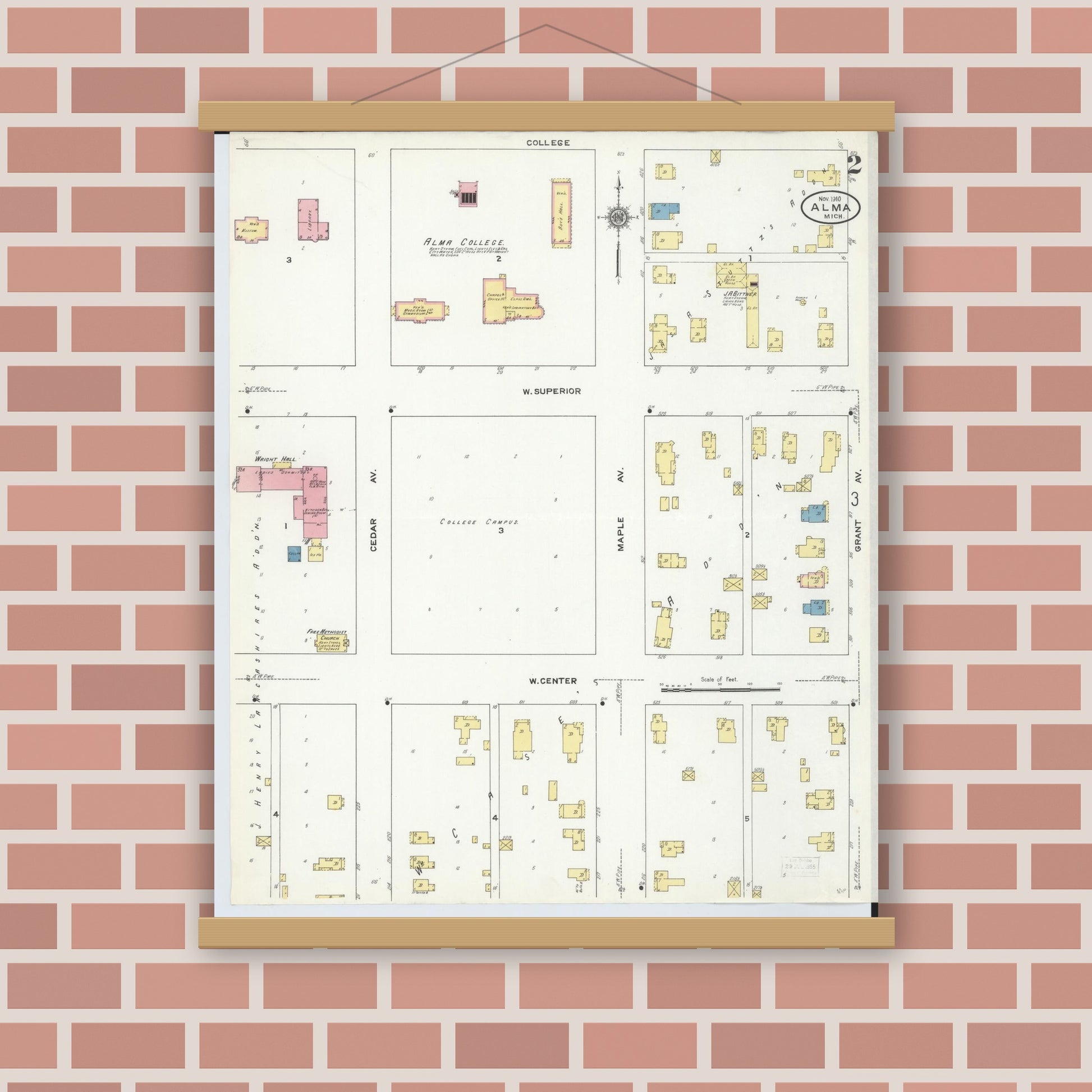 Old map wall art mockup — magnetic wood frame on brick wall — Sanborn Fire Insurance Map from Alma, Gratiot County, Michigan (1910), Sheet #0002