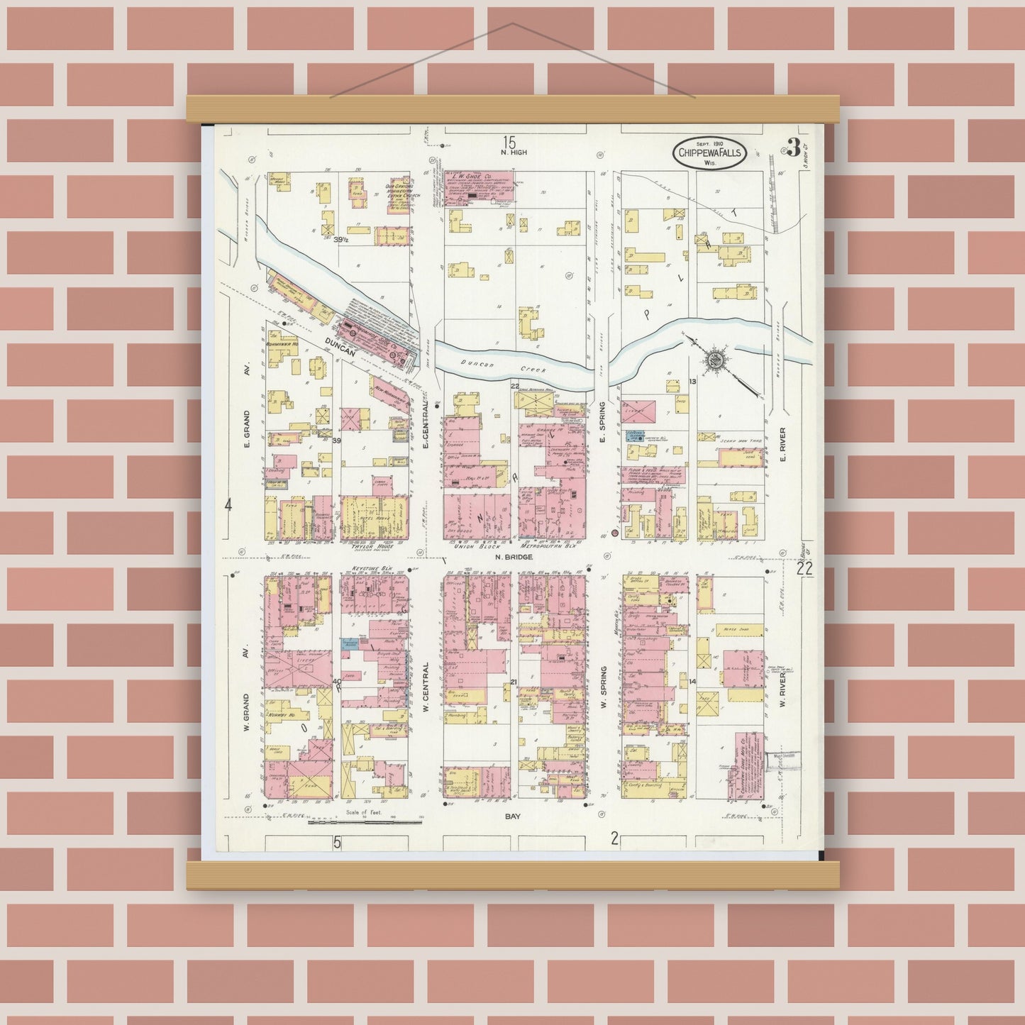 Old map wall art mockup — magnetic wood frame on brick wall — Sanborn Fire Insurance Map from Chippewa Falls, Chippewa County, Wisconsin (1910), Sheet #0003