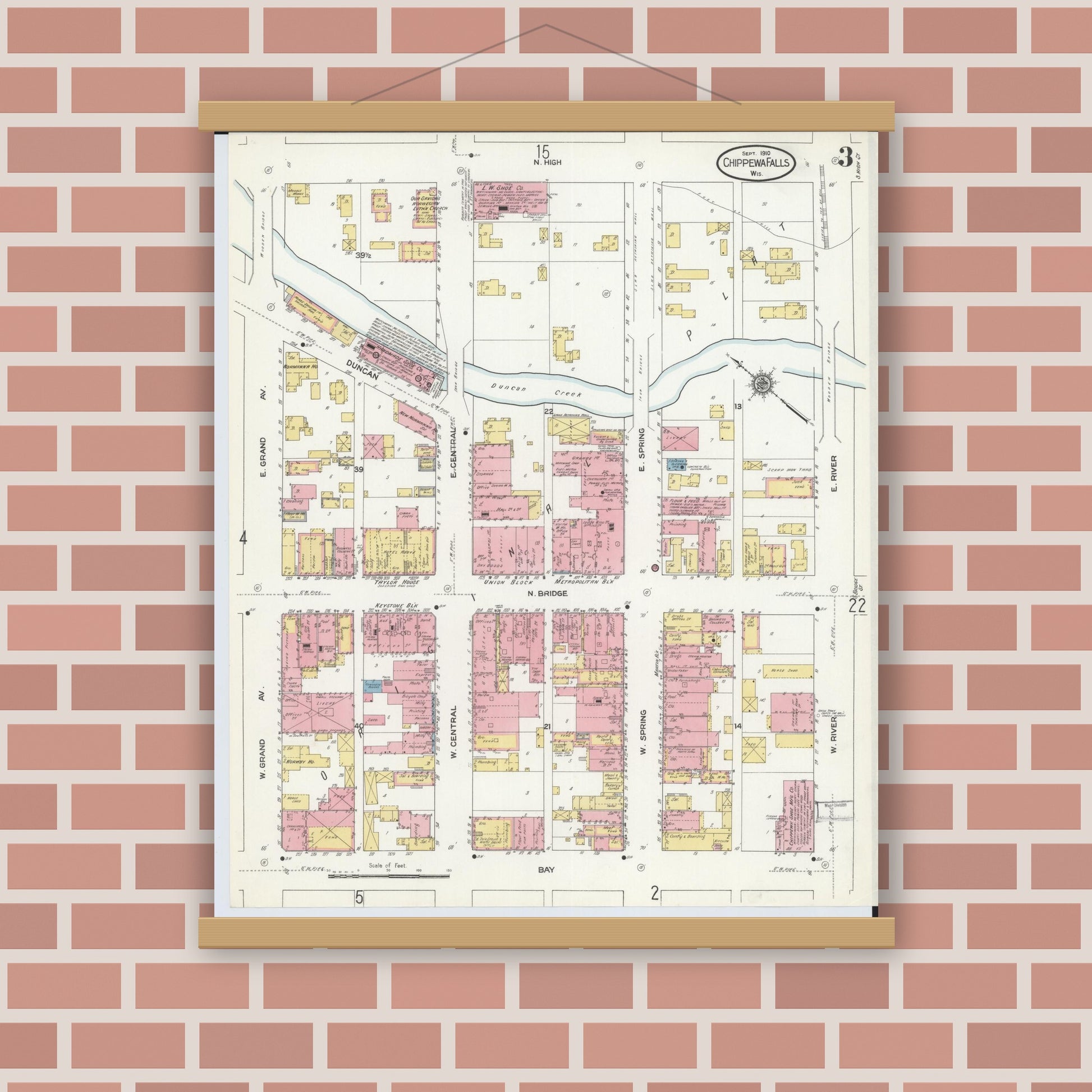 Old map wall art mockup — magnetic wood frame on brick wall — Sanborn Fire Insurance Map from Chippewa Falls, Chippewa County, Wisconsin (1910), Sheet #0003