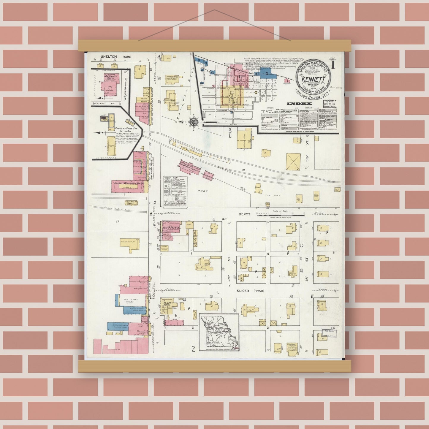 Old map wall art mockup — magnetic wood frame on brick wall — Sanborn Fire Insurance Map from Kennett, Dunklin County, Missouri (1919), Sheet #0001