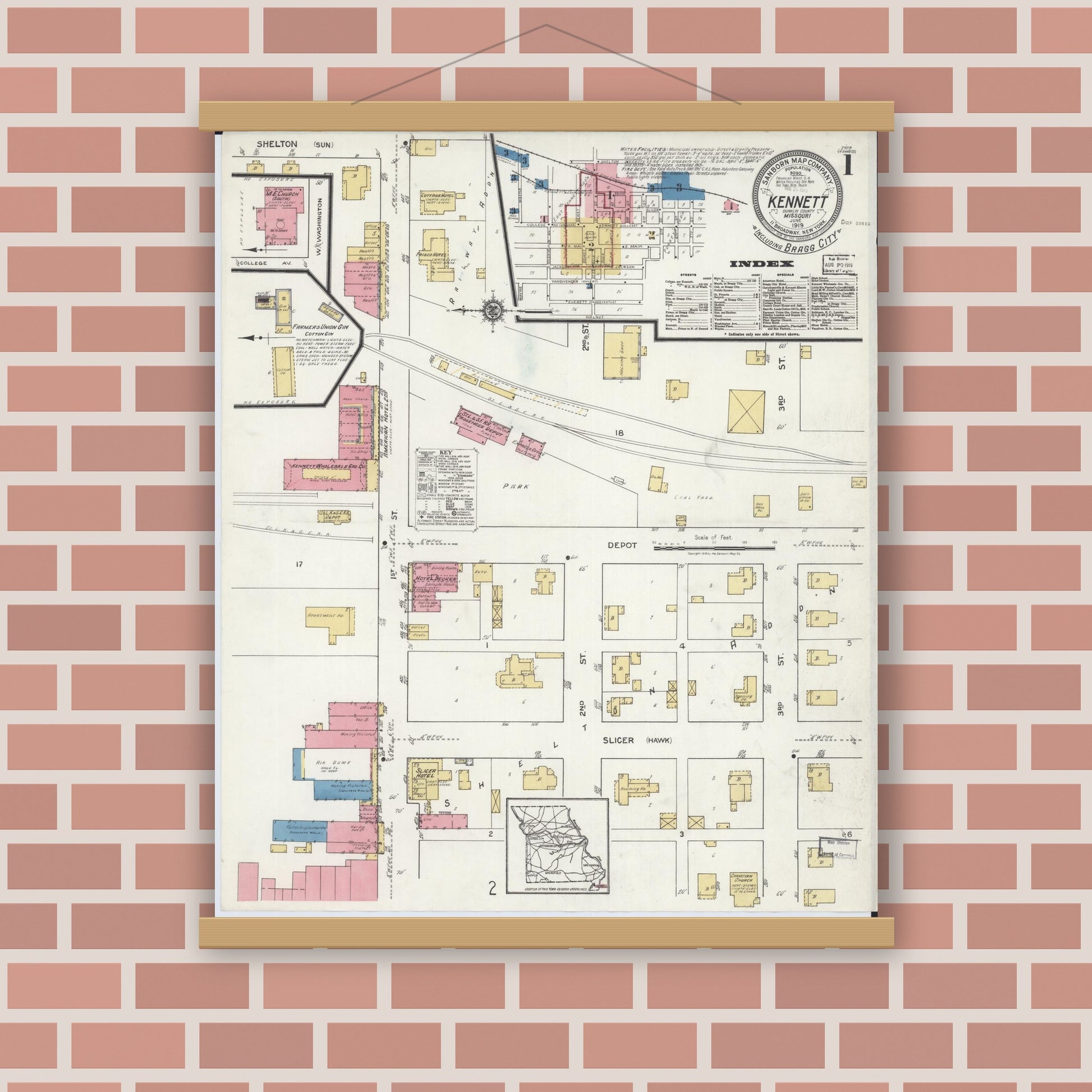 Old map wall art mockup — magnetic wood frame on brick wall — Sanborn Fire Insurance Map from Kennett, Dunklin County, Missouri (1919), Sheet #0001