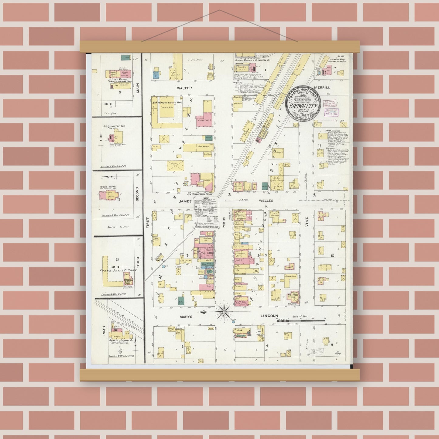Old map wall art mockup — magnetic wood frame on brick wall — Sanborn Fire Insurance Map from Brown City, Sanilac County, Michigan (1909), Sheet #0001