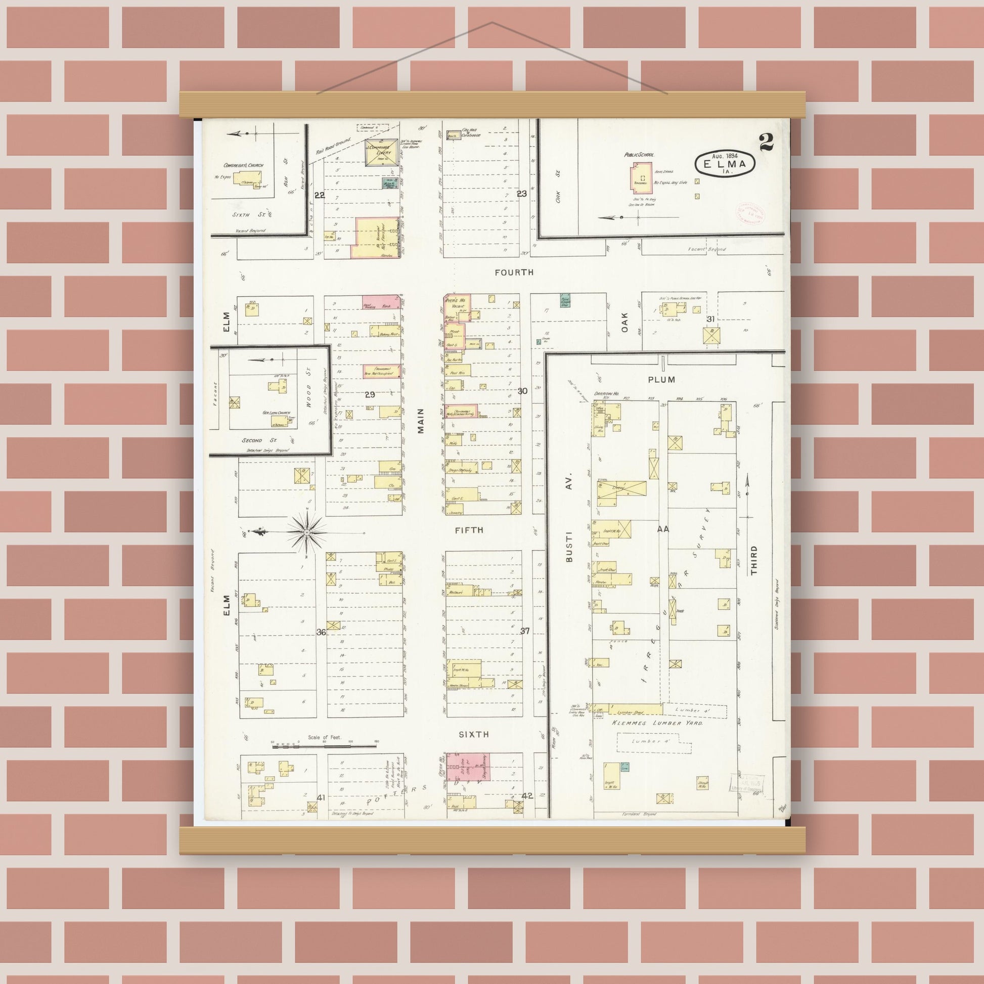 Old map wall art mockup — magnetic wood frame on brick wall — Sanborn Fire Insurance Map from Elma, Howard County, Iowa (1894), Sheet #0002