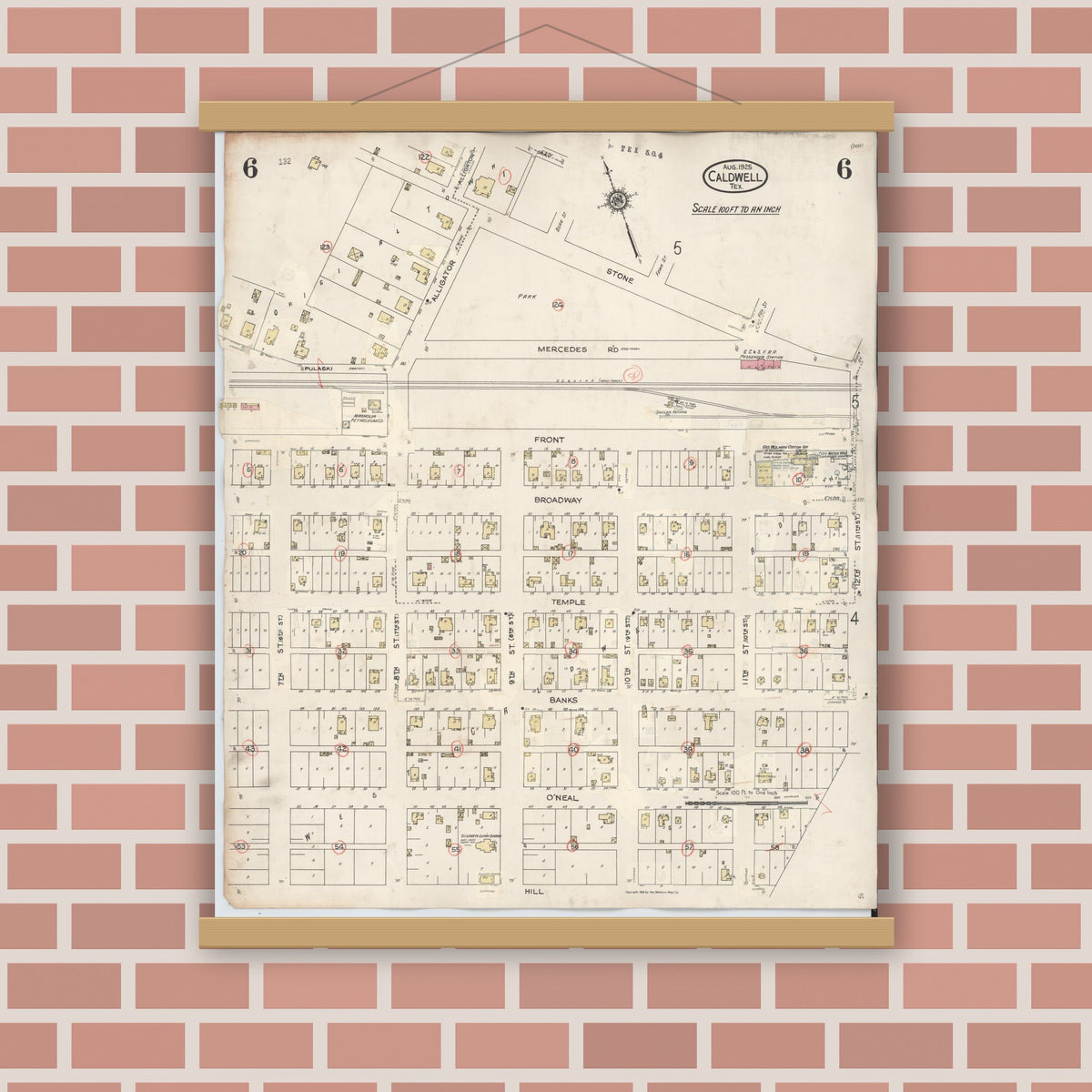 Old map wall art mockup — magnetic wood frame on brick wall — Sanborn Fire Insurance Map from Caldwell, Burleson County, Texas (1943), Sheet #0006
