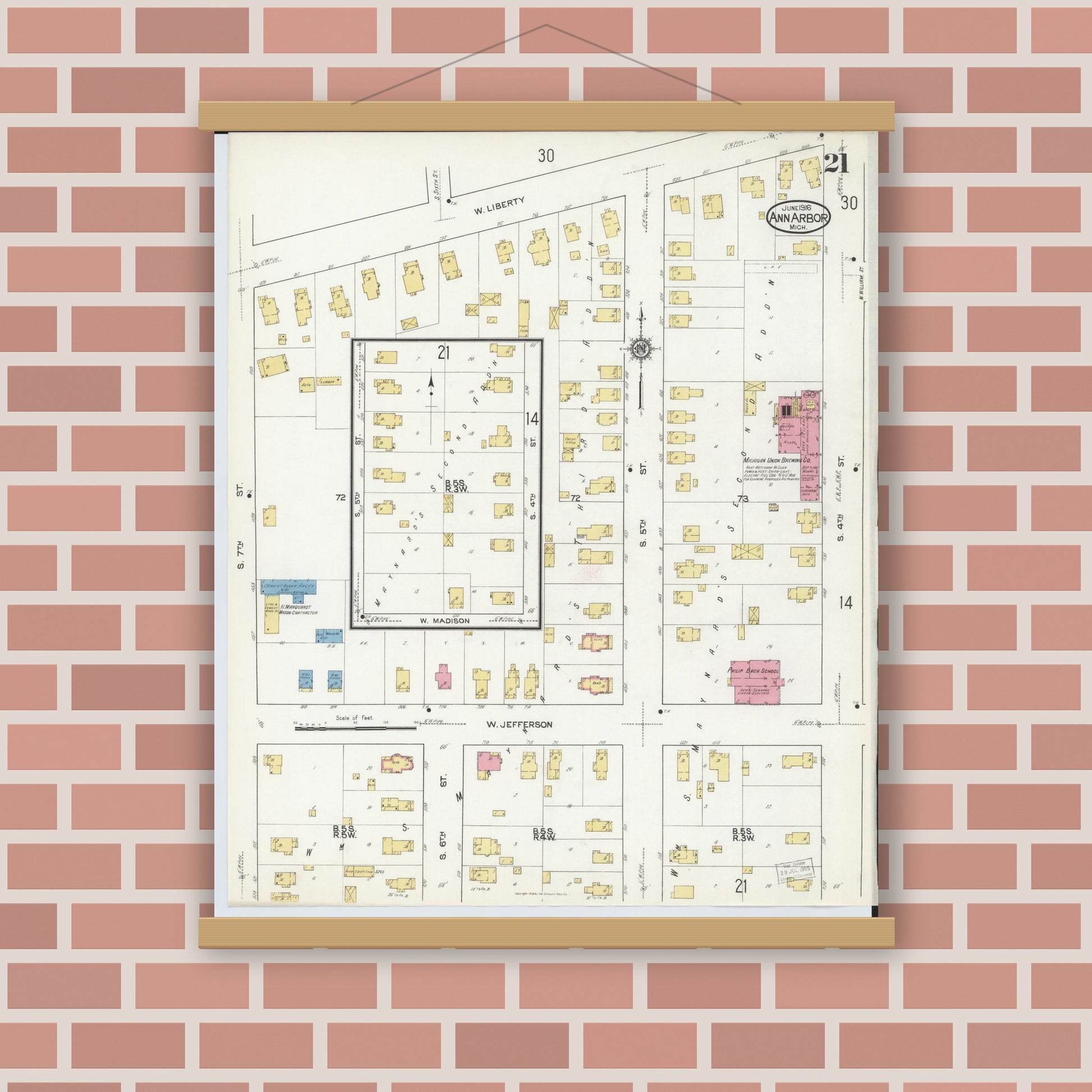 Old map wall art mockup — magnetic wood frame on brick wall — Sanborn Fire Insurance Map from Ann Arbor, Washtenaw County, Michigan (1916), Sheet #0021