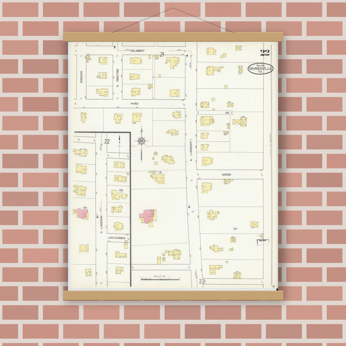 Old map wall art mockup — magnetic wood frame on brick wall — Sanborn Fire Insurance Map from Gainesville, Cooke County, Texas (1913), Sheet #0022