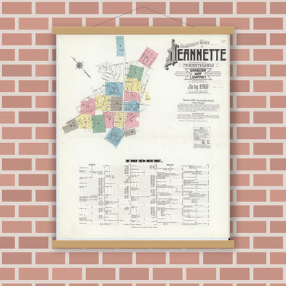 Old map wall art mockup — magnetic wood frame on brick wall — Sanborn Fire Insurance Map from Jeannette, Westmoreland County, Pennsylvania (1910), Sheet #0001