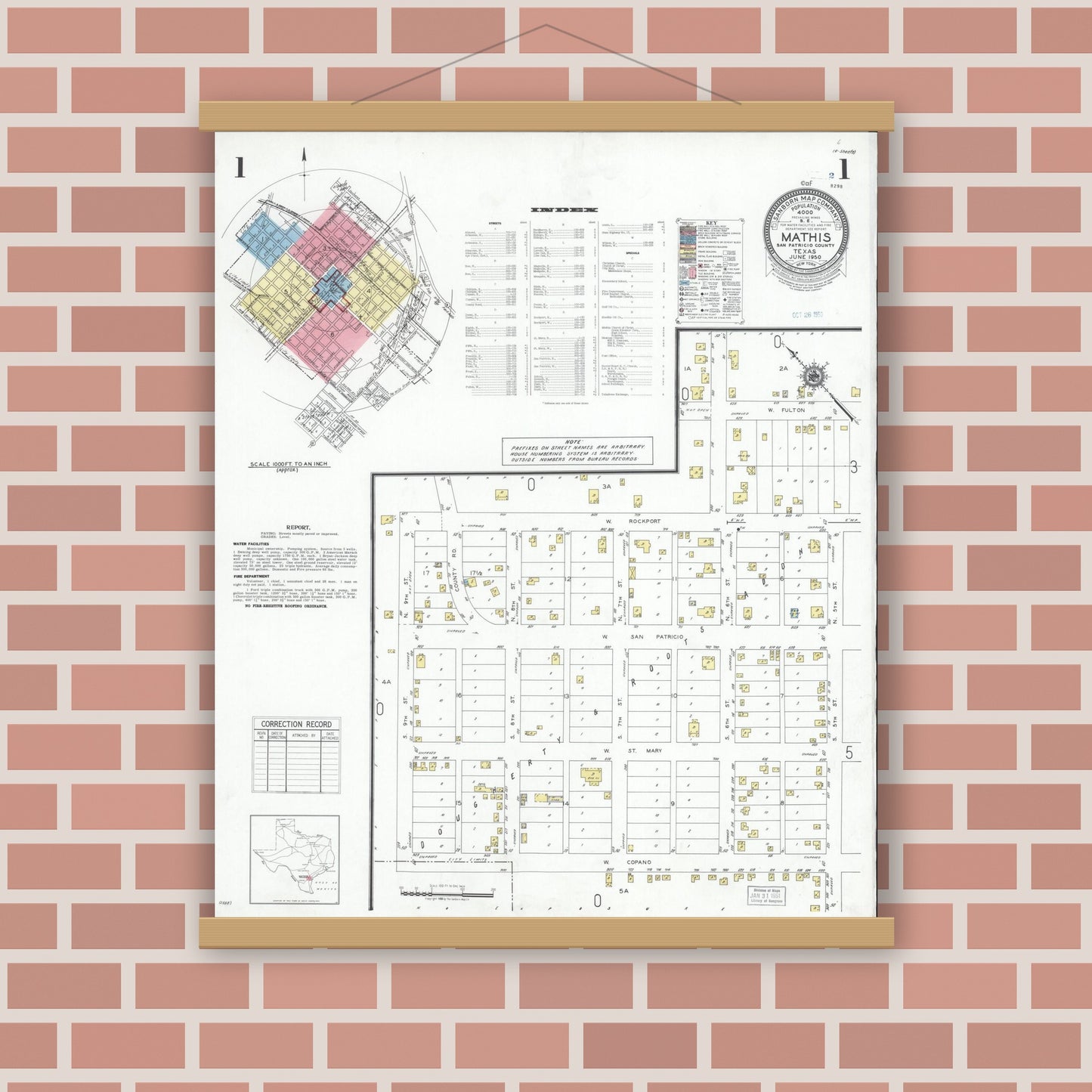 Old map wall art mockup — magnetic wood frame on brick wall — Sanborn Fire Insurance Map from Mathis, San Patricio County, Texas (1950), Sheet #0001