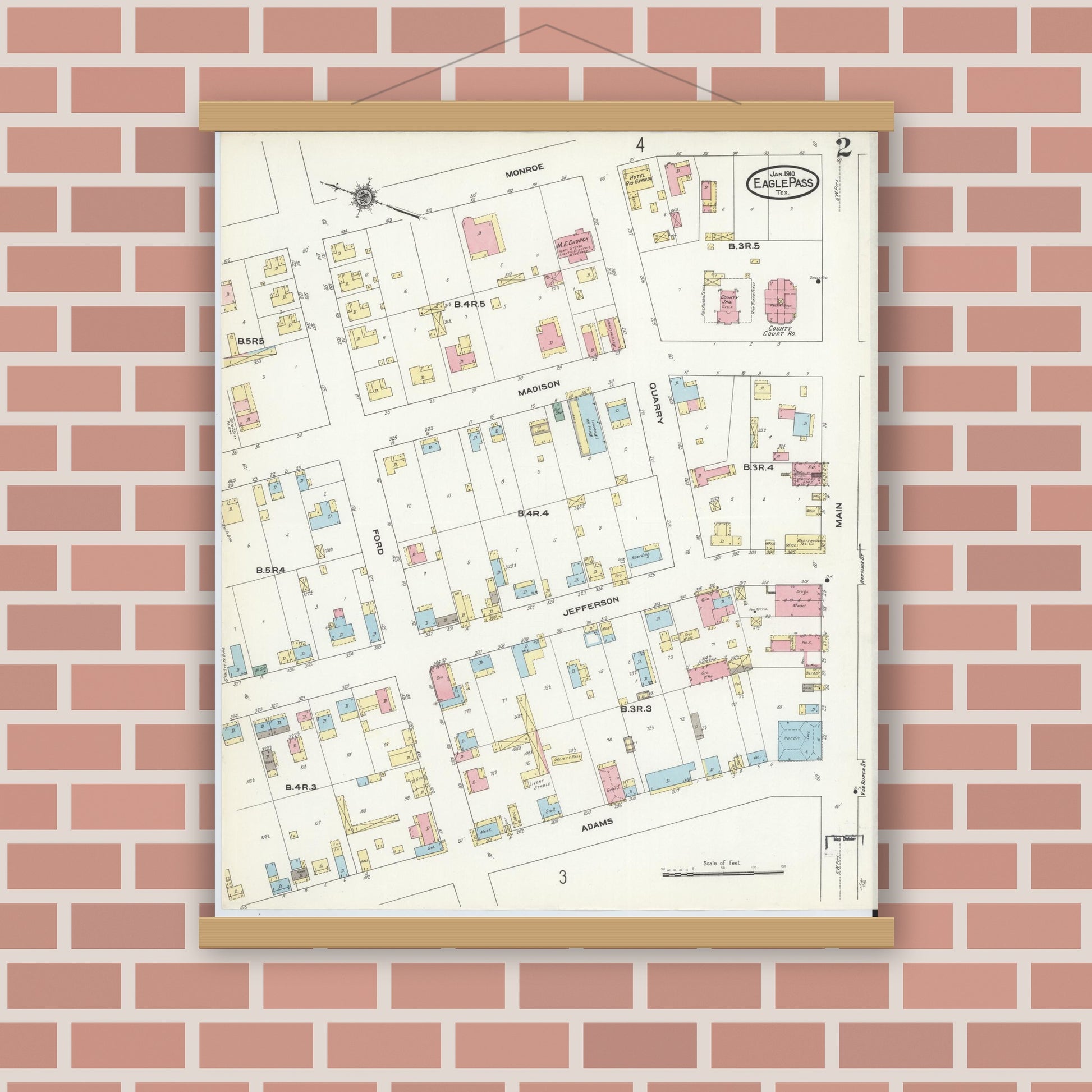 Old map wall art mockup — magnetic wood frame on brick wall — Sanborn Fire Insurance Map from Eagle Pass, Maverick County, Texas (1910), Sheet #0002