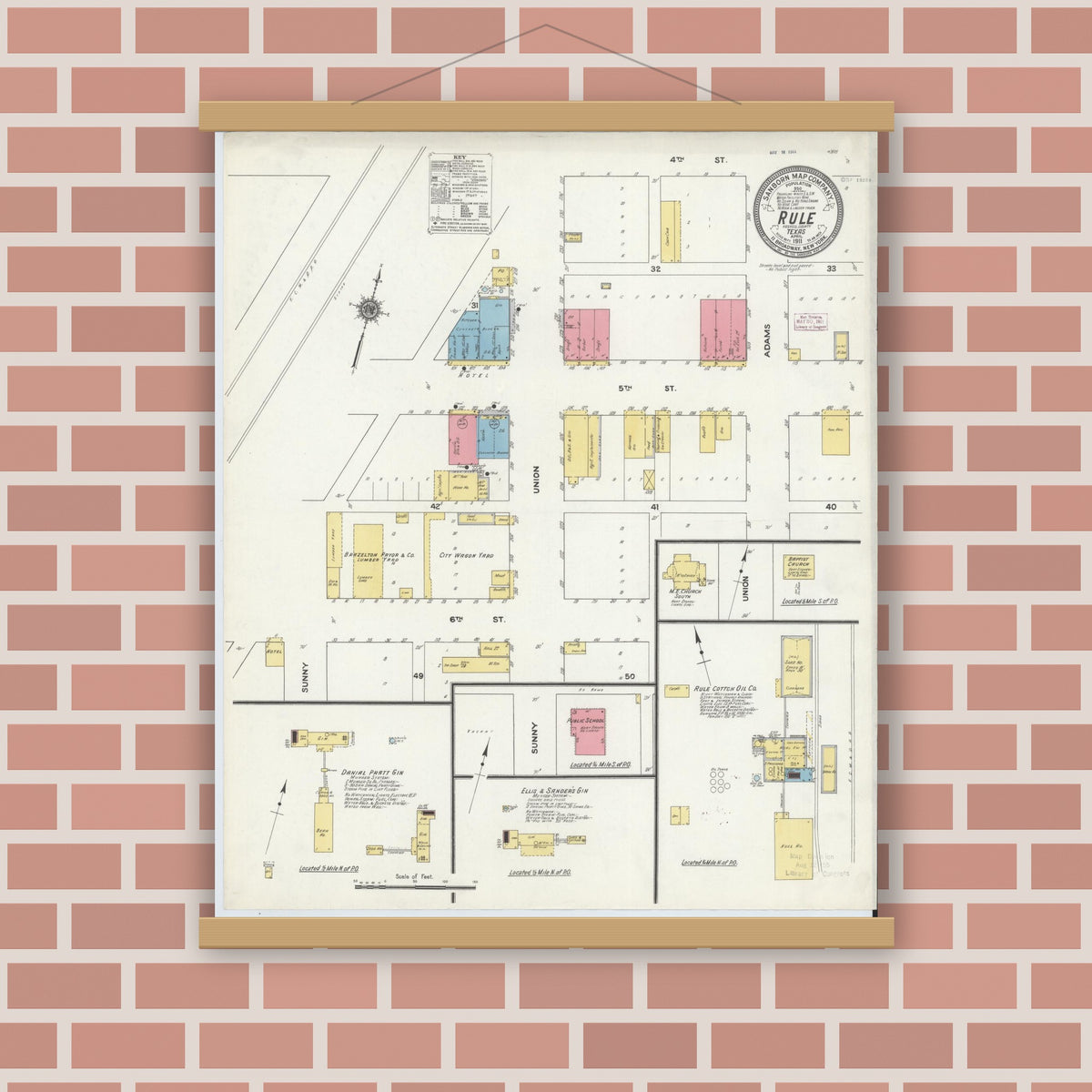 Old map wall art mockup — magnetic wood frame on brick wall — Sanborn Fire Insurance Map from Rule, Haskell County, Texas (1911), Sheet #0001
