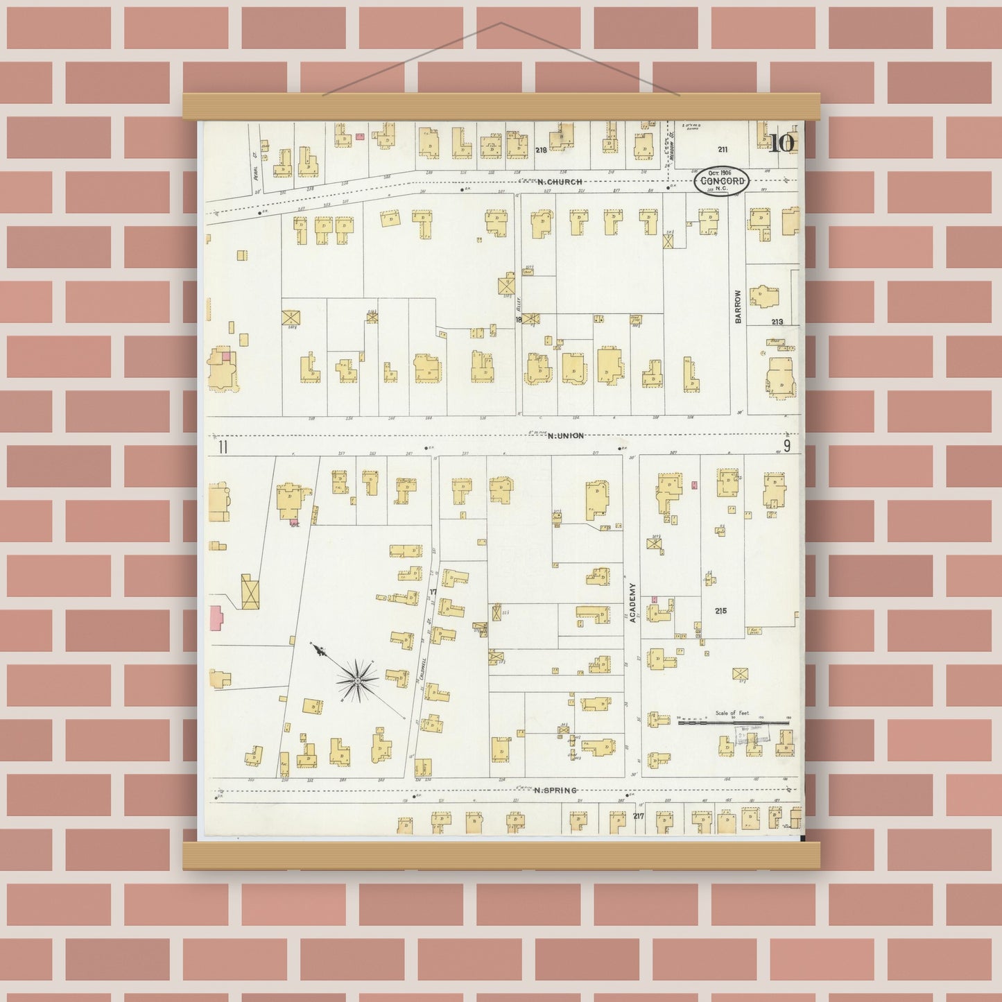 Old map wall art mockup — magnetic wood frame on brick wall — Sanborn Fire Insurance Map from Concord, Cabarrus County, North Carolina (1906), Sheet #0010