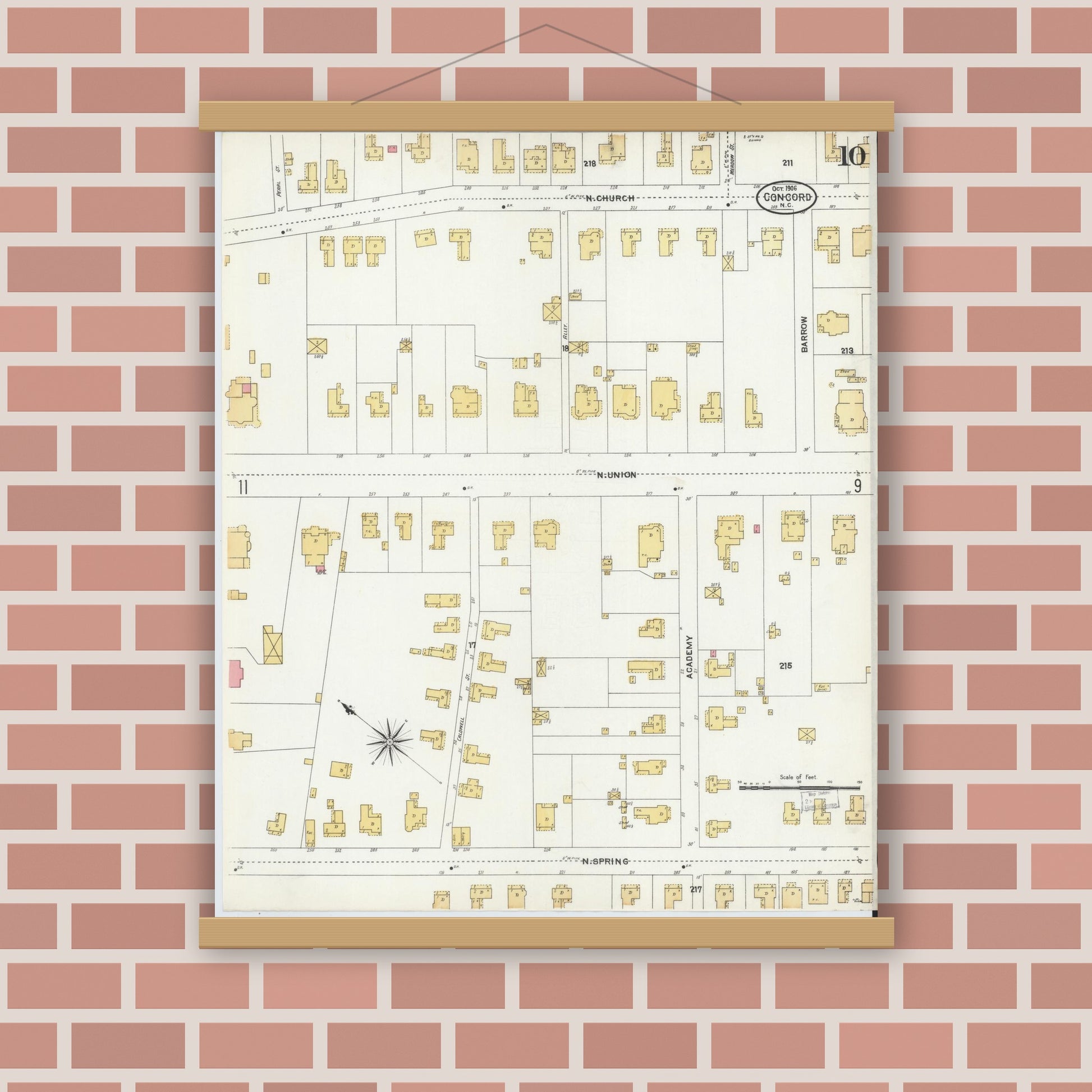 Old map wall art mockup — magnetic wood frame on brick wall — Sanborn Fire Insurance Map from Concord, Cabarrus County, North Carolina (1906), Sheet #0010