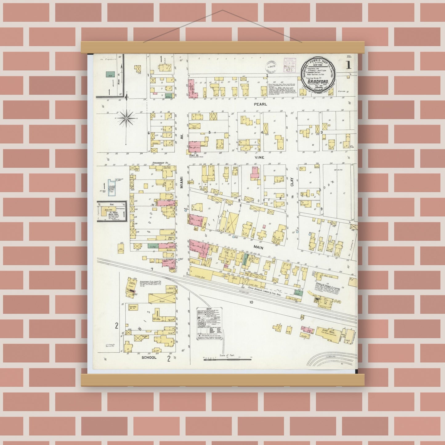 Old map wall art mockup — magnetic wood frame on brick wall — Sanborn Fire Insurance Map from Bradford, Darke and Miami Counties, Ohio (1901), Sheet #0001