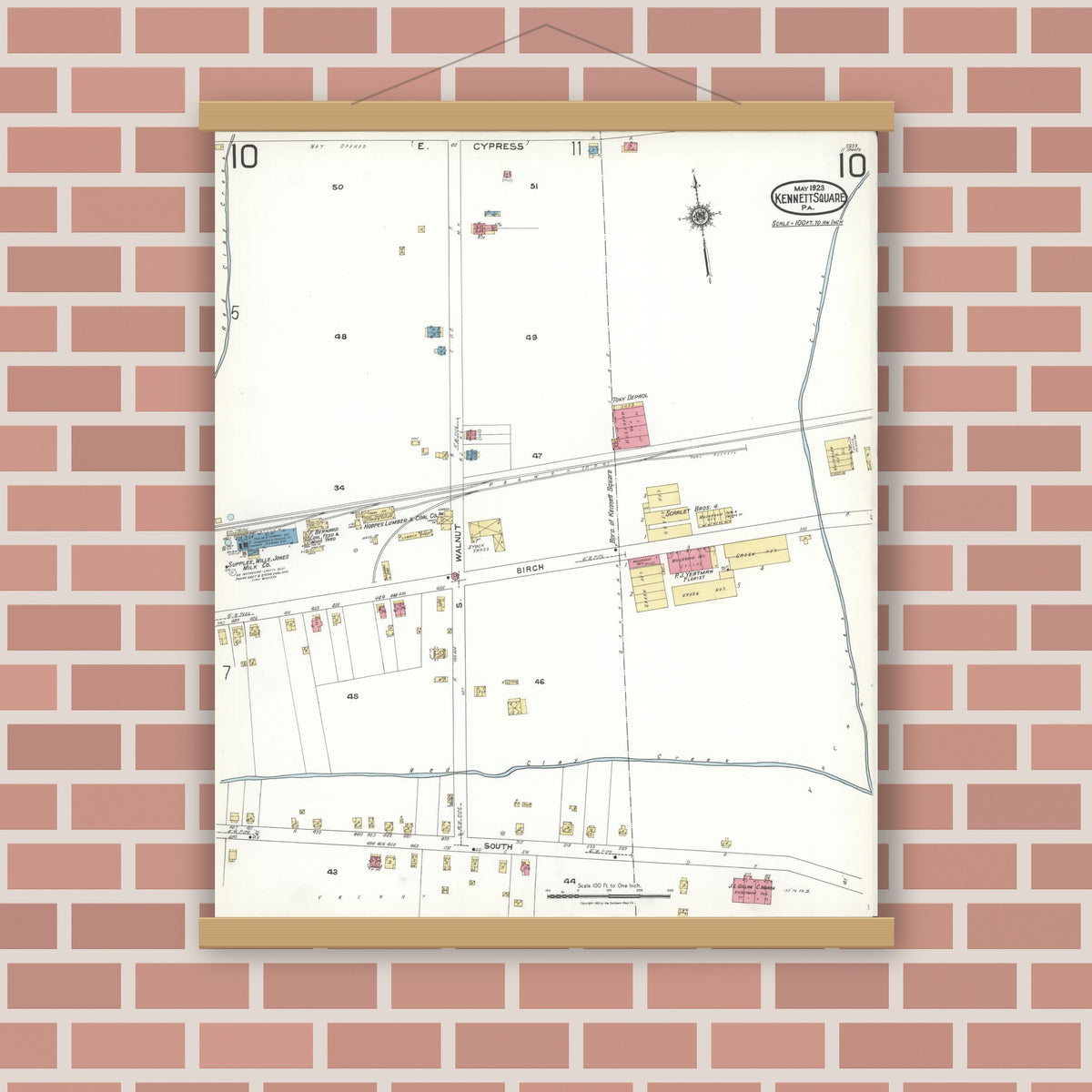Old map wall art mockup — magnetic wood frame on brick wall — Sanborn Fire Insurance Map from Kennett Square, Chester County, Pennsylvania (1923), Sheet #0010