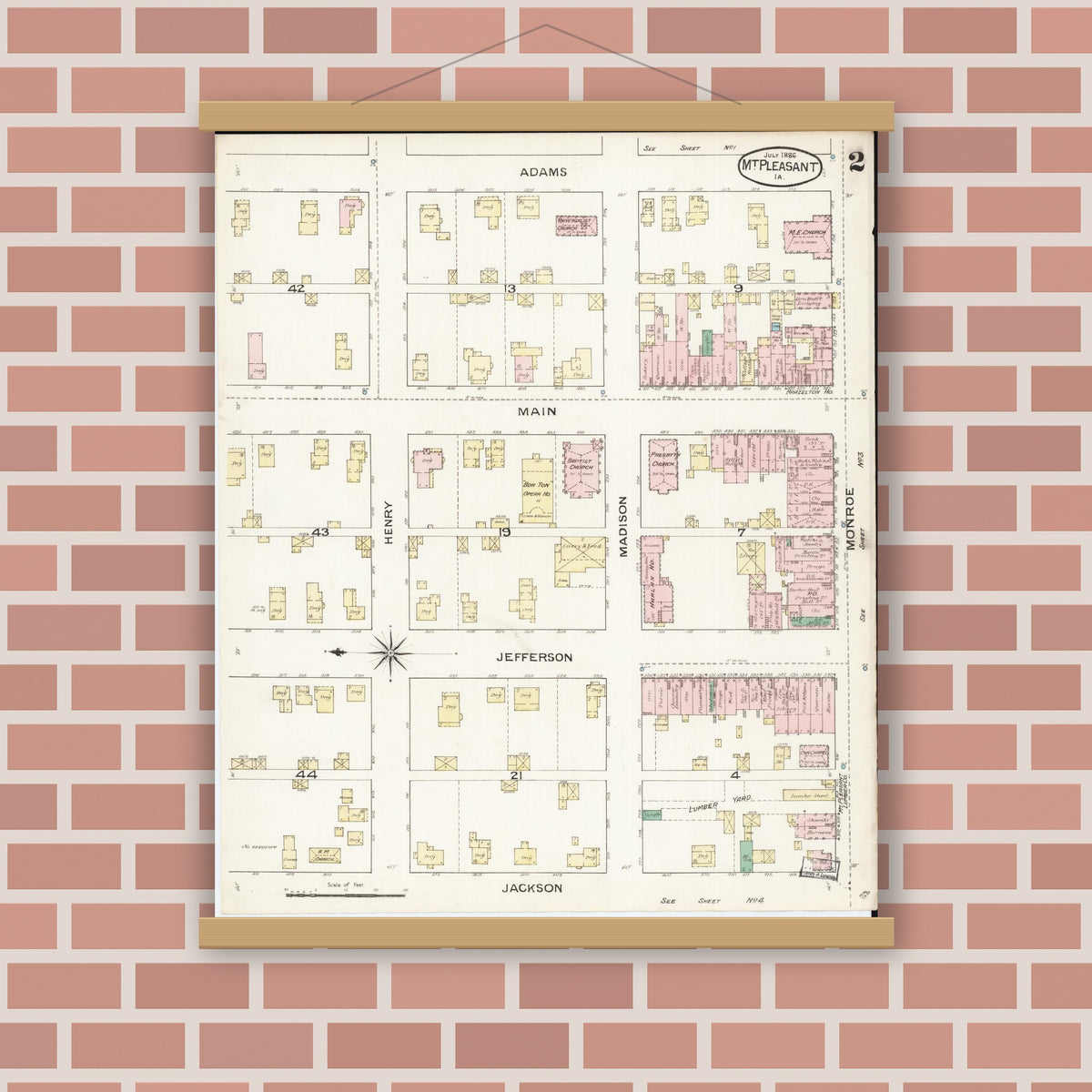 Old map wall art mockup — magnetic wood frame on brick wall — Sanborn Fire Insurance Map from Mount Pleasant, Henry County, Iowa (1886), Sheet #0002