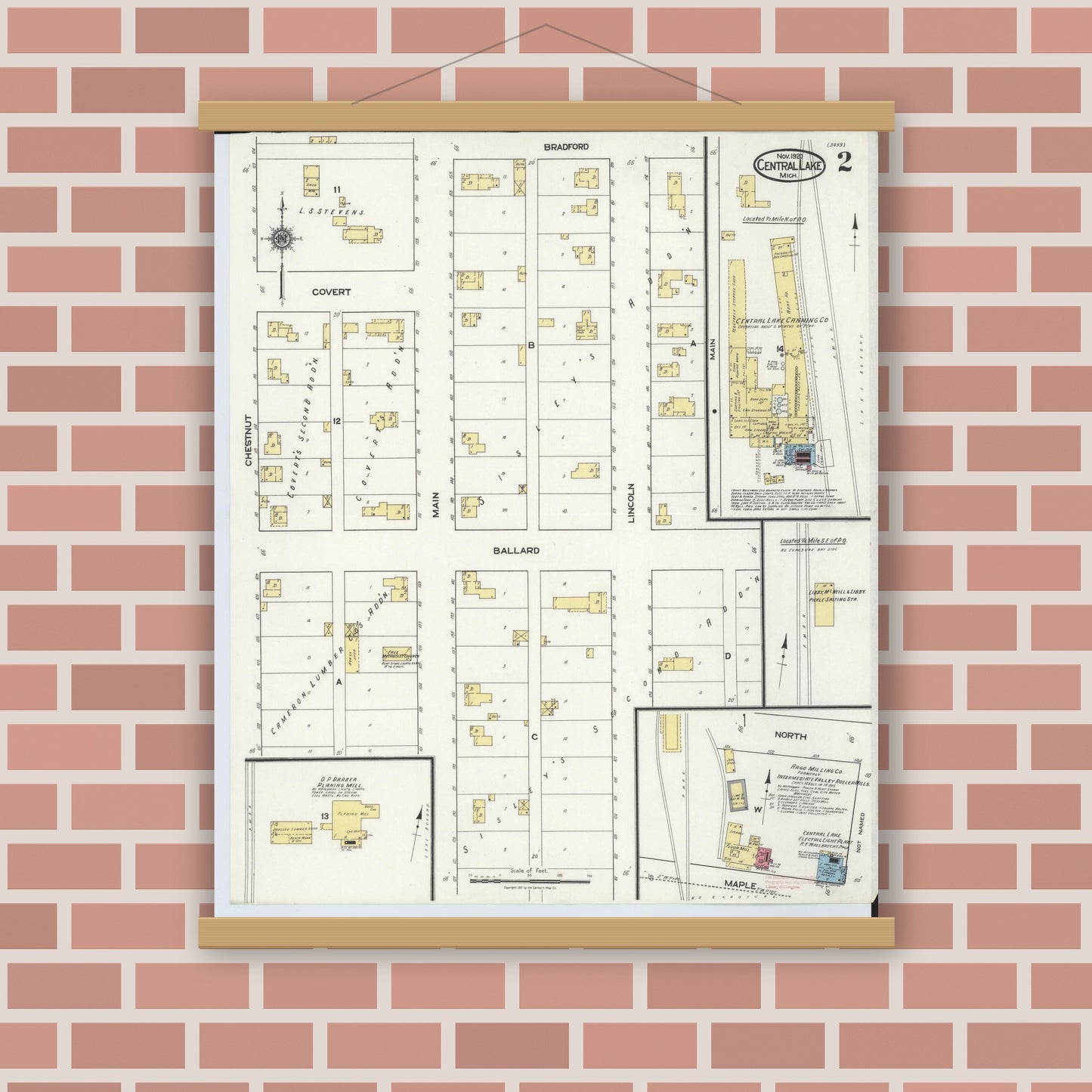 Old map wall art mockup — magnetic wood frame on brick wall — Sanborn Fire Insurance Map from Central Lake, Antrim County, Michigan (1920), Sheet #0002