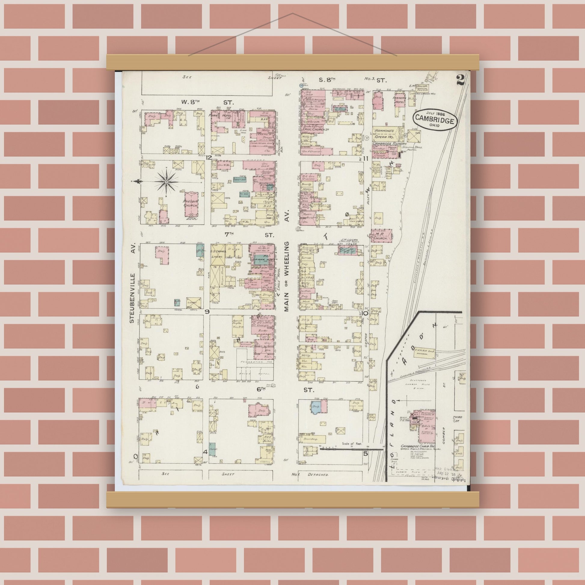 Old map wall art mockup — magnetic wood frame on brick wall — Sanborn Fire Insurance Map from Cambridge, Guernsey County, Ohio (1886), Sheet #0002