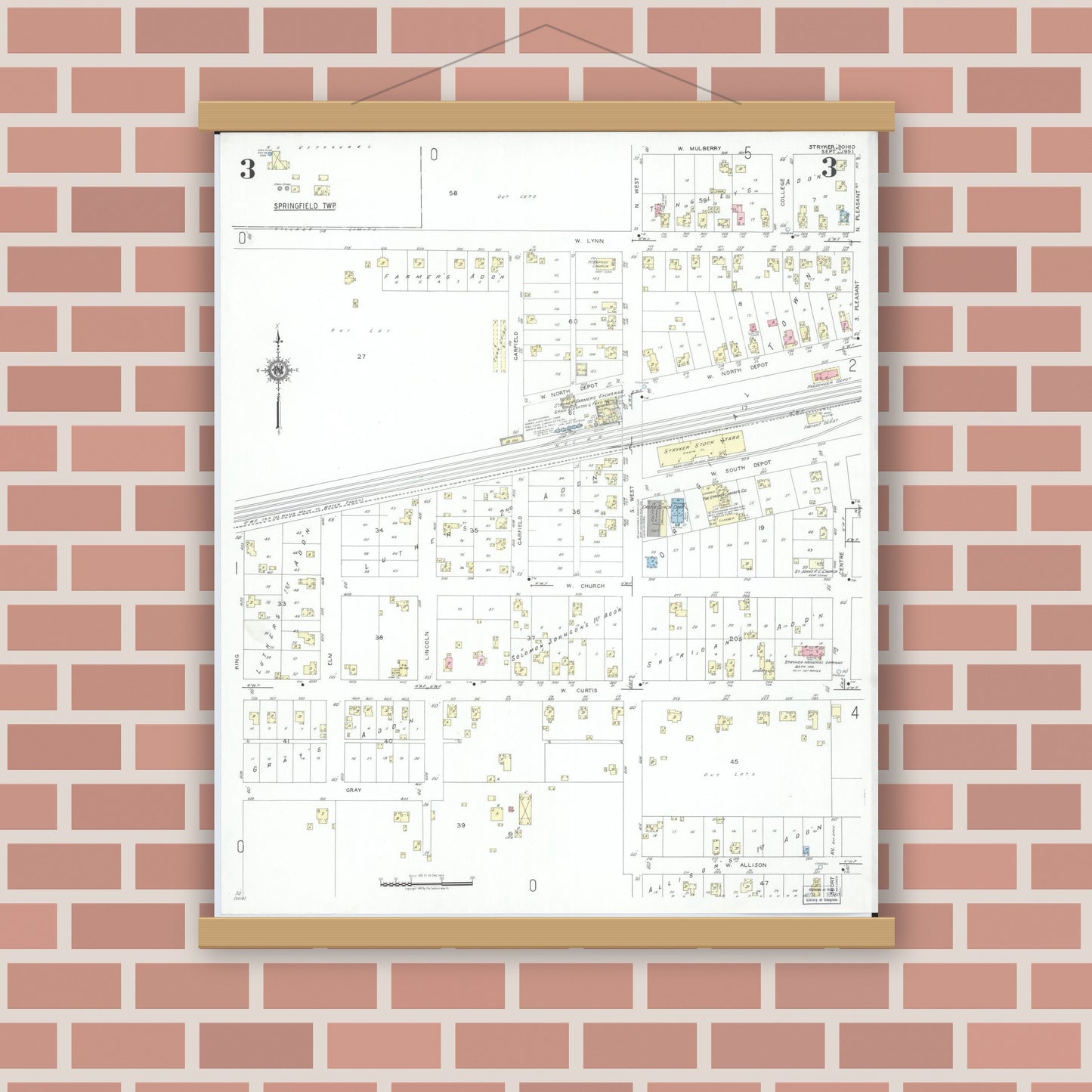 Old map wall art mockup — magnetic wood frame on brick wall — Sanborn Fire Insurance Map from Stryker, Williams County, Ohio (1951), Sheet #0003