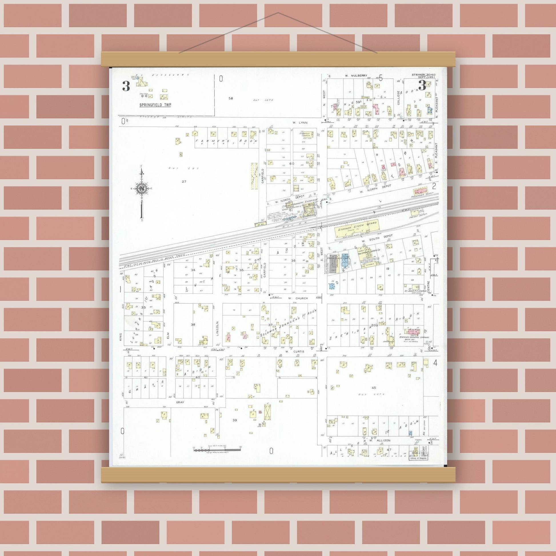 Old map wall art mockup — magnetic wood frame on brick wall — Sanborn Fire Insurance Map from Stryker, Williams County, Ohio (1951), Sheet #0003