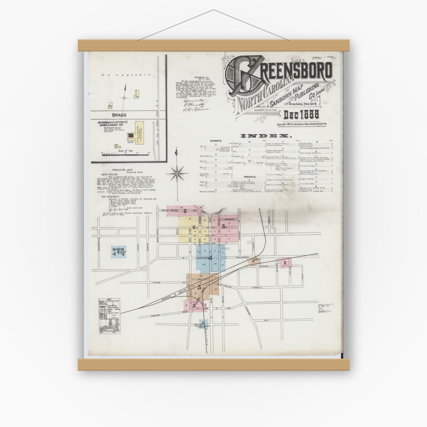 Old map wall art mockup — magnetic wood frame on white wall — Sanborn Fire Insurance Map from Greensboro, Guilford County, North Carolina (1888), Sheet #0001