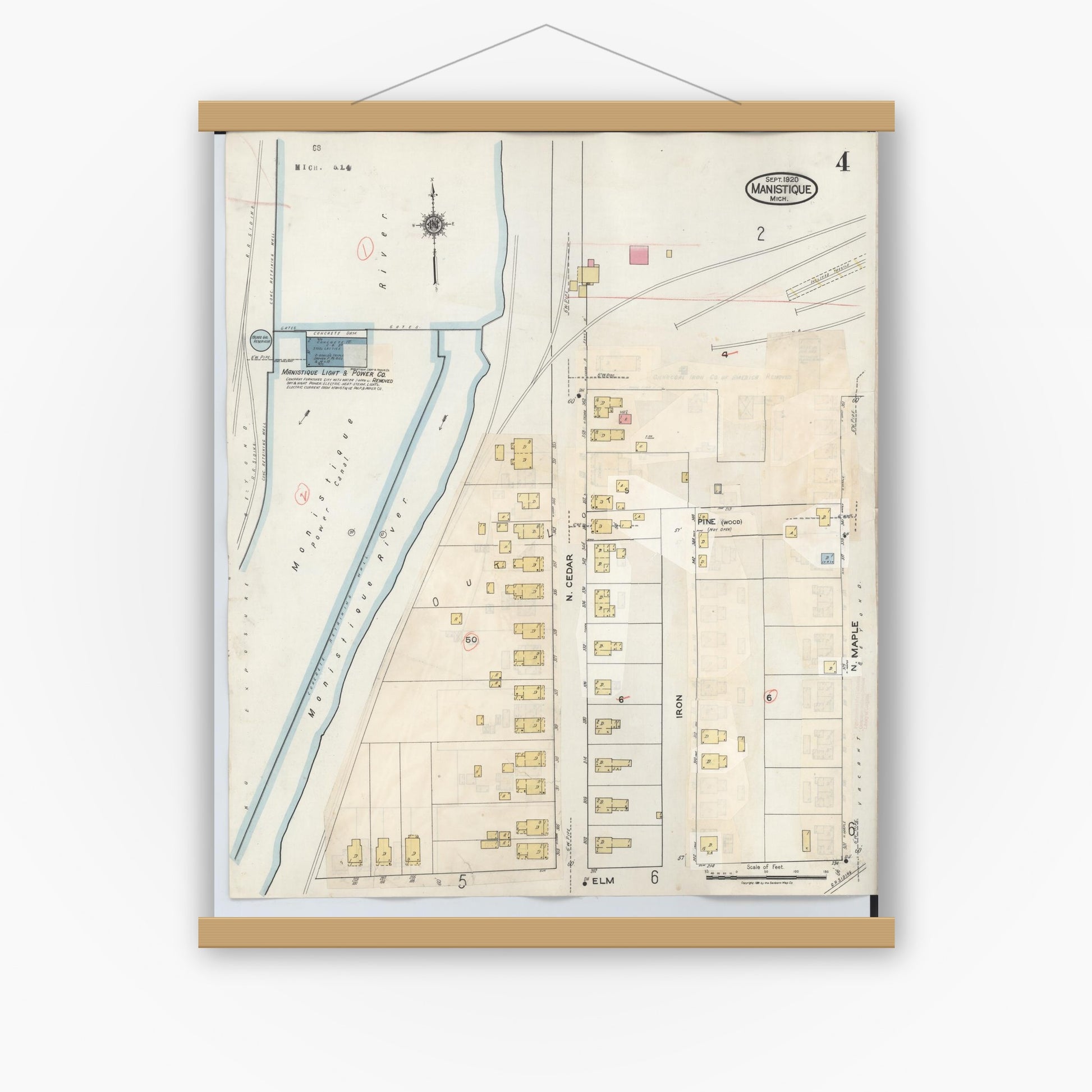 Old map wall art mockup — magnetic wood frame on white wall — Sanborn Fire Insurance Map from Manistique, Schoolcraft County, Michigan (1950), Sheet #0004