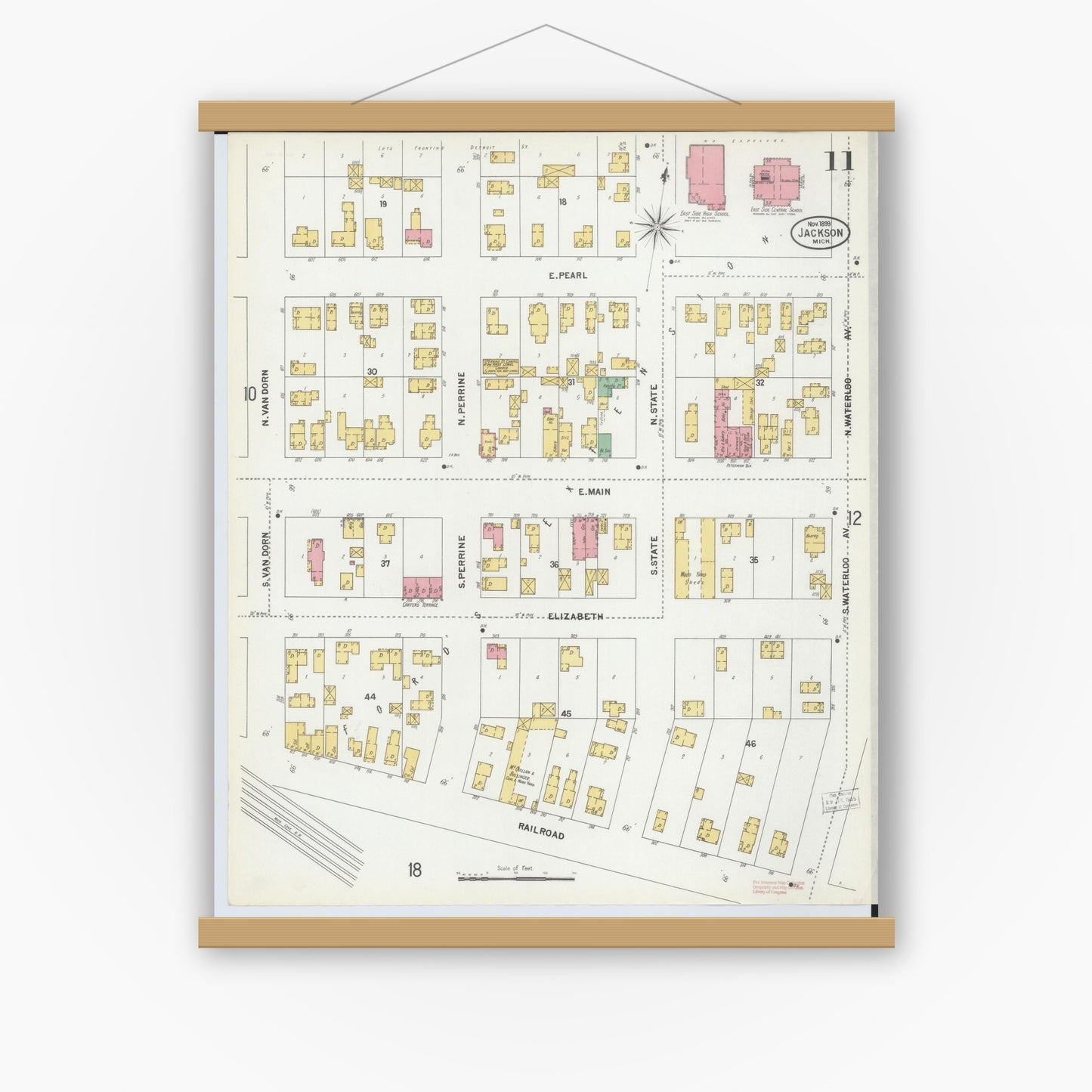 Old map wall art mockup — magnetic wood frame on white wall — Sanborn Fire Insurance Map from Jackson, Jackson County, Michigan (1899), Sheet #0011