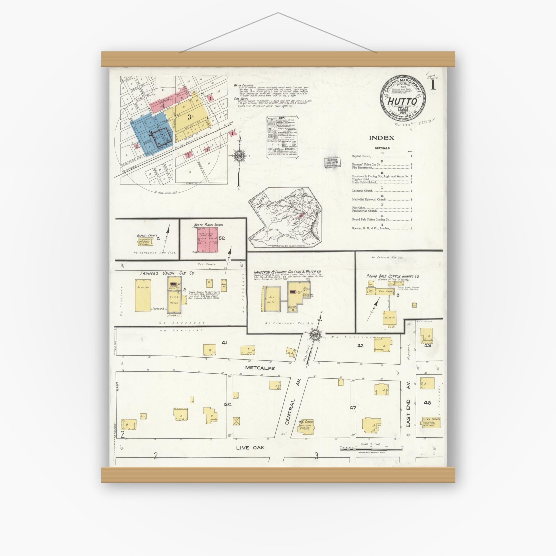 Old map wall art mockup — magnetic wood frame on white wall — Sanborn Fire Insurance Map from Hutto, Williamson County, Texas (1921), Sheet #0001