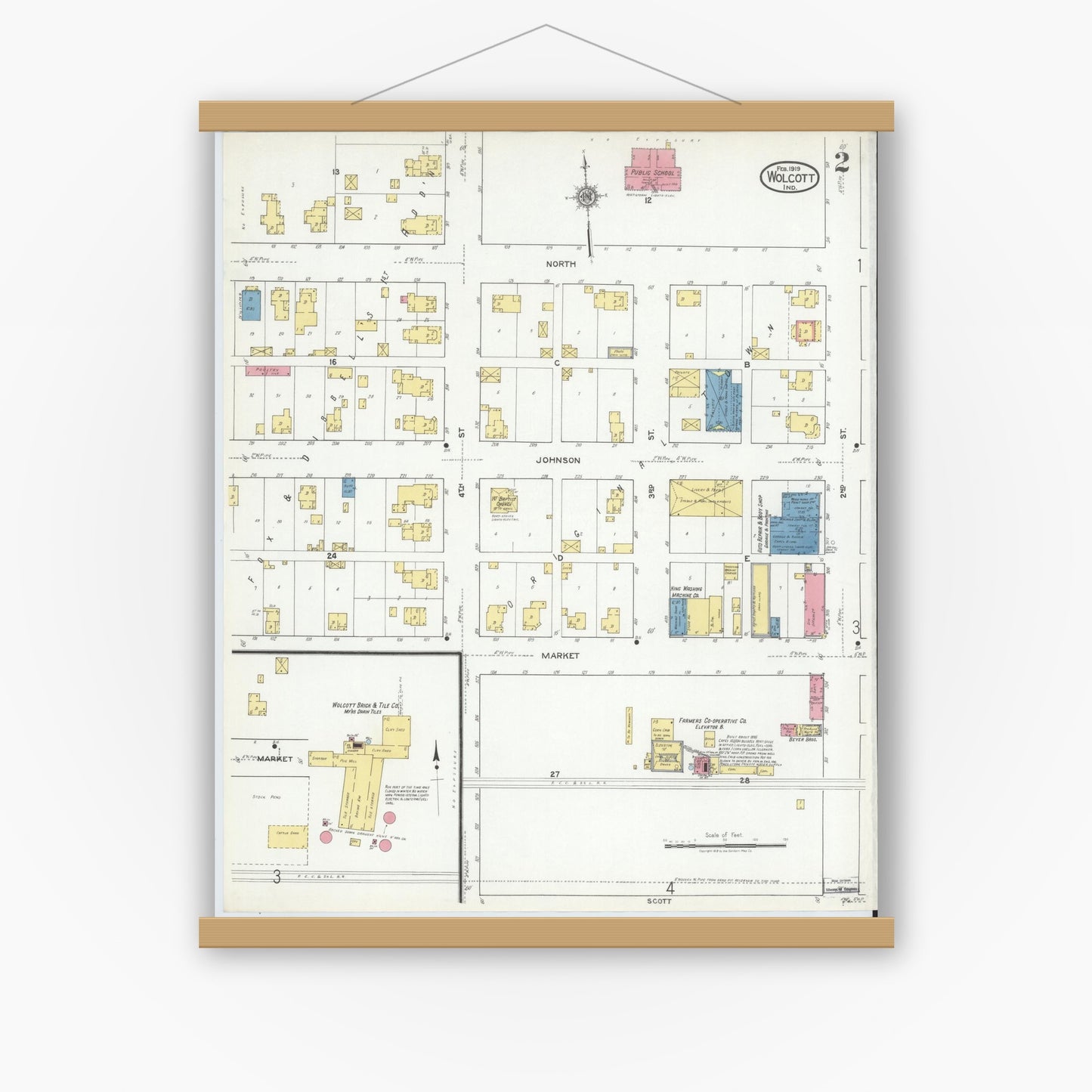 Old map wall art mockup — magnetic wood frame on white wall — Sanborn Fire Insurance Map from Wolcott, White County, Indiana (1919), Sheet #0002
