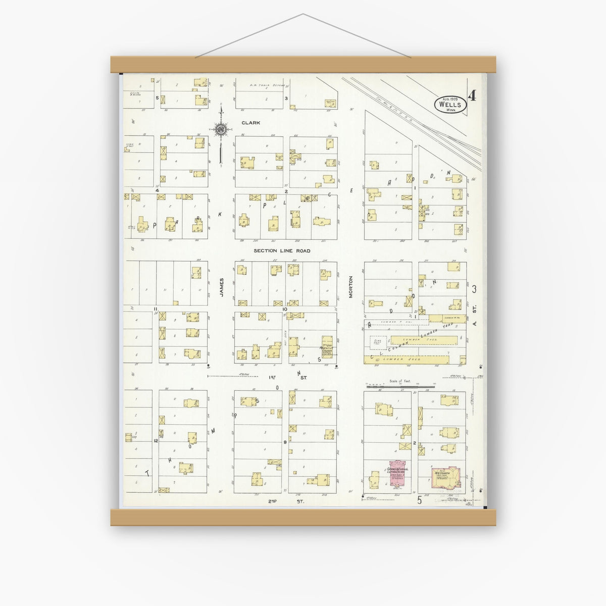 Old map wall art mockup — magnetic wood frame on white wall — Sanborn Fire Insurance Map from Wells, Faribault County, Minnesota (1909), Sheet #0004