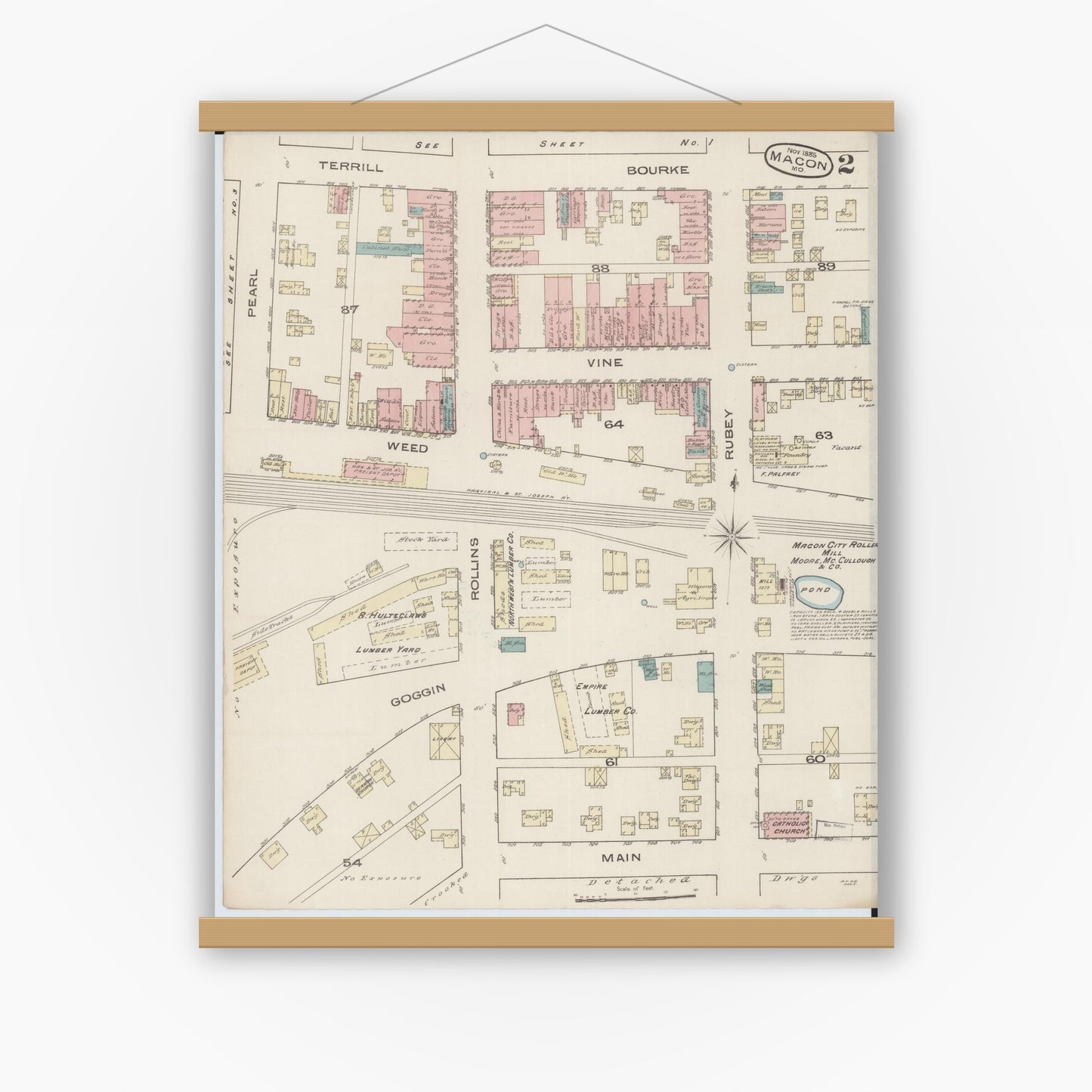 Old map wall art mockup — magnetic wood frame on white wall — Sanborn Fire Insurance Map from Macon, Macon County, Missouri (1885), Sheet #0002