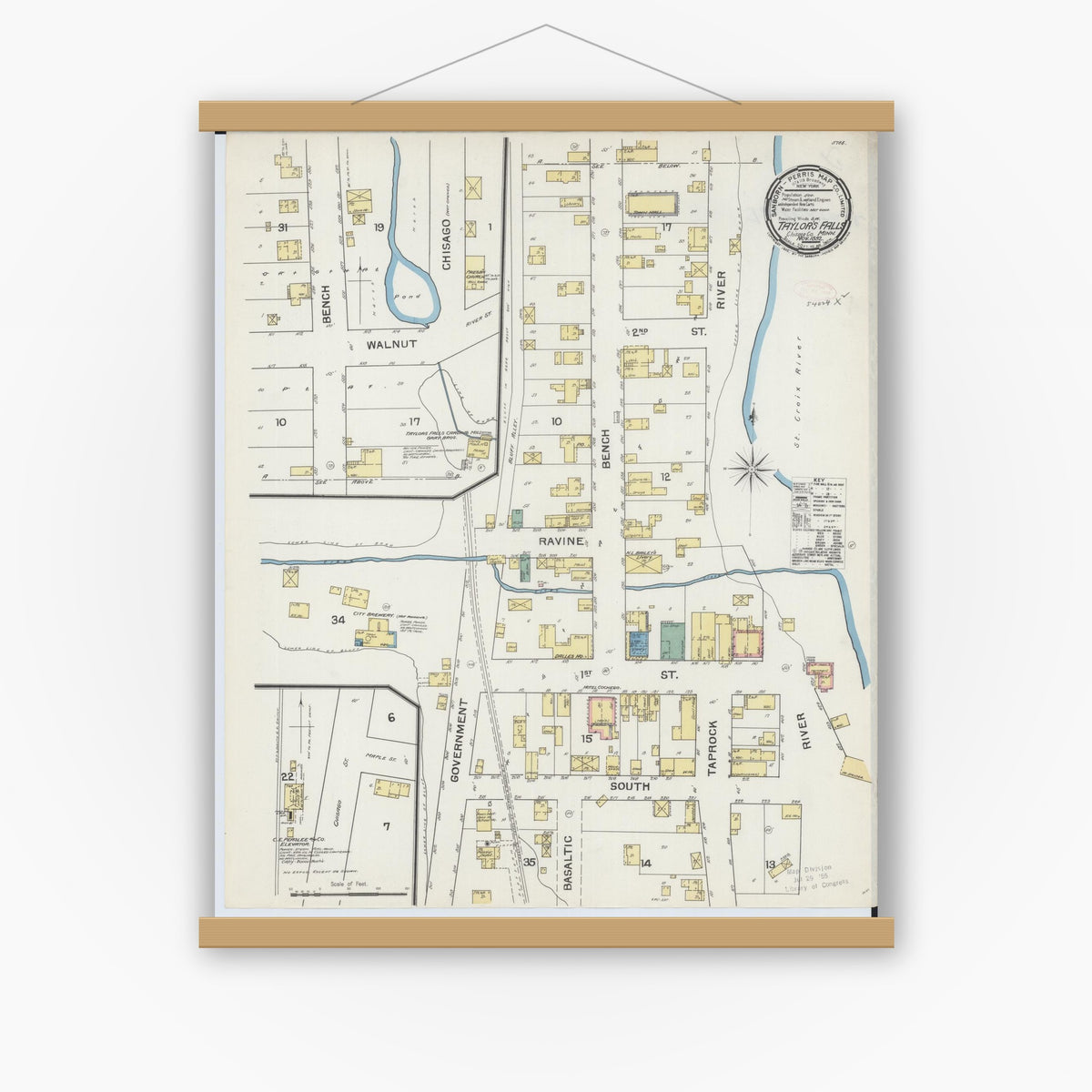 Old map wall art mockup — magnetic wood frame on white wall — Sanborn Fire Insurance Map from Taylors Falls, Chisago County, Minnesota (1892), Sheet #0001