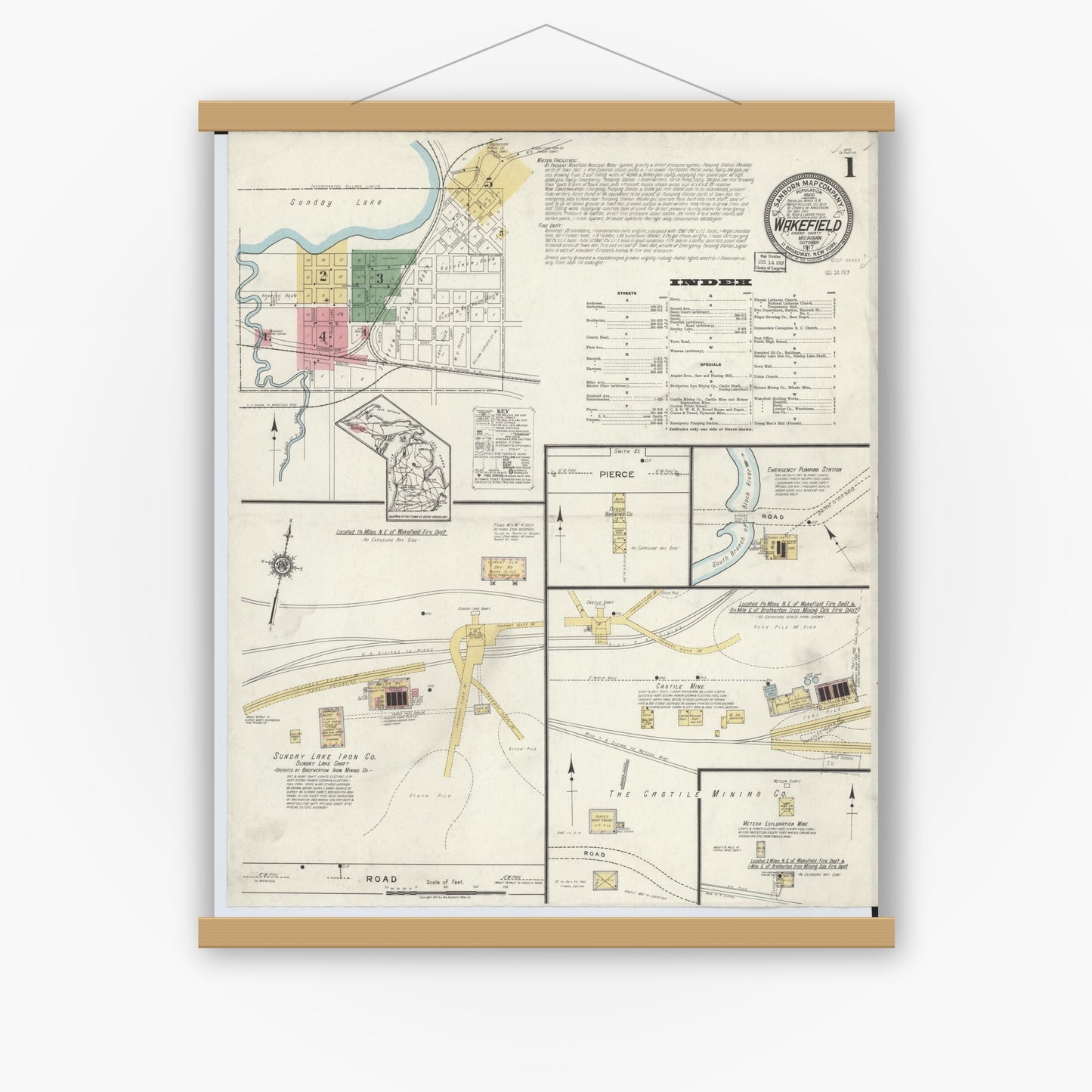 Old map wall art mockup — magnetic wood frame on white wall — Sanborn Fire Insurance Map from Wakefield, Gogebic County, Michigan (1917) - Complete Map Set
