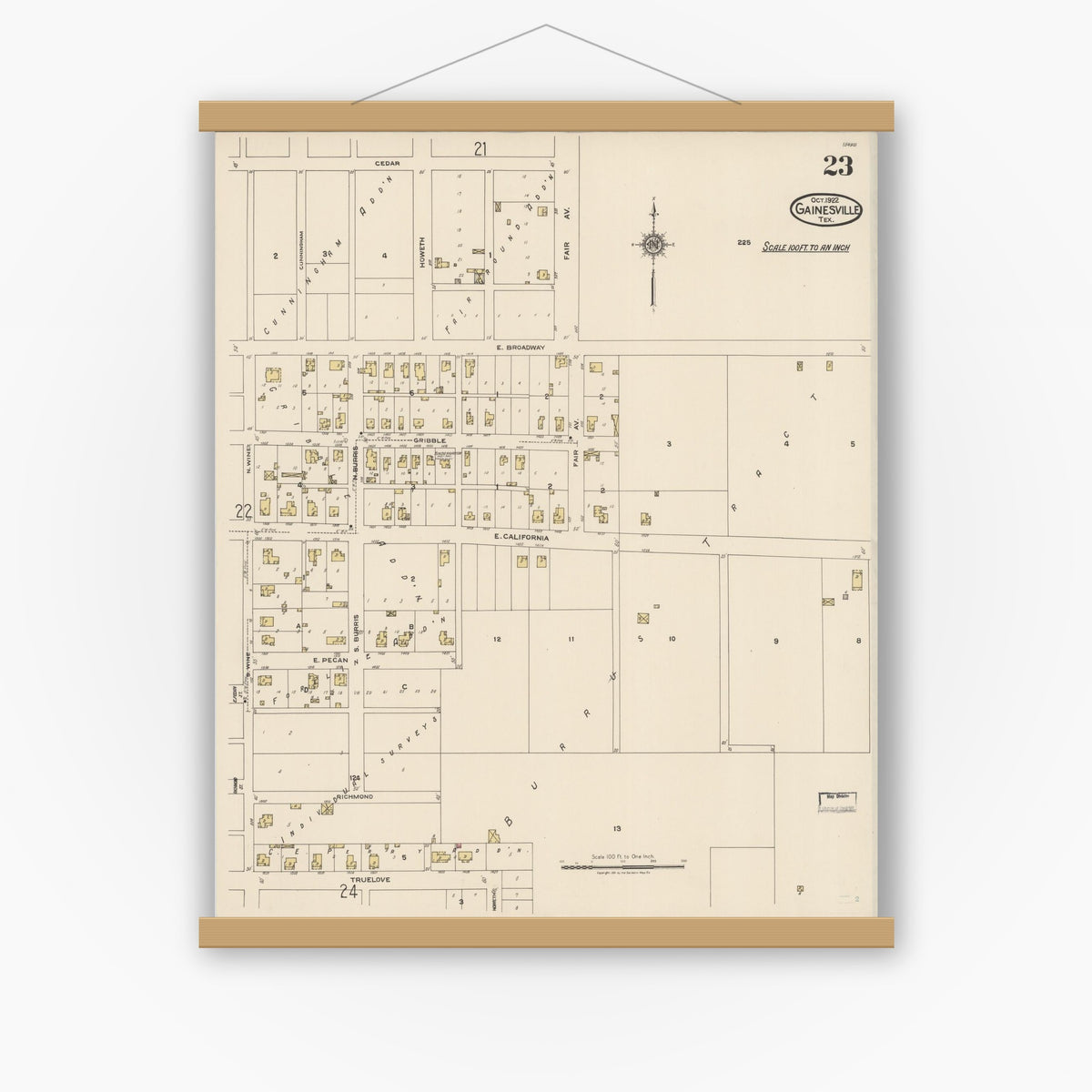 Old map wall art mockup — magnetic wood frame on white wall — Sanborn Fire Insurance Map from Gainesville, Cooke County, Texas (1922), Sheet #0023