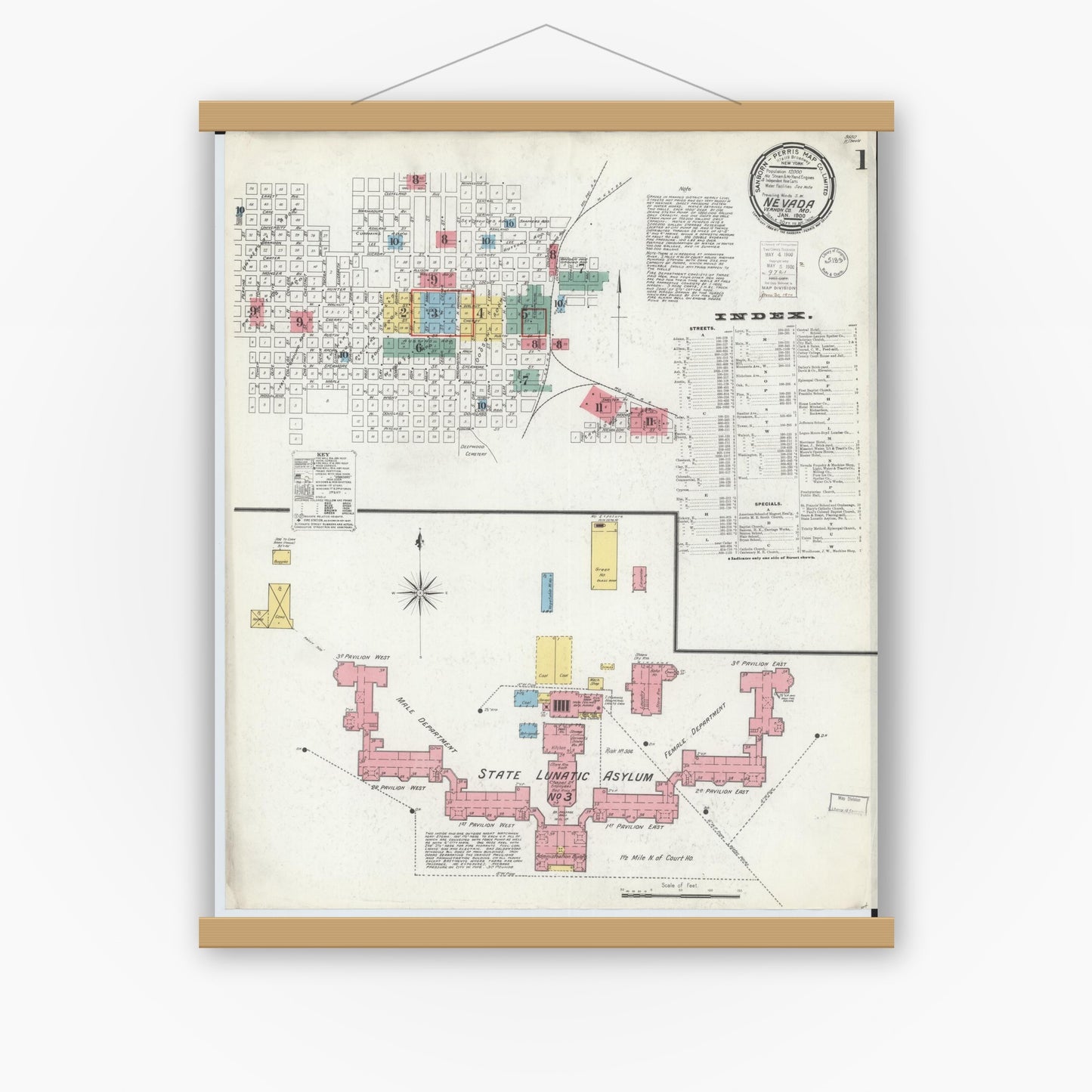 Old map wall art mockup — magnetic wood frame on white wall — Sanborn Fire Insurance Map from Nevada, Vernon County, Missouri (1900), Sheet #0001