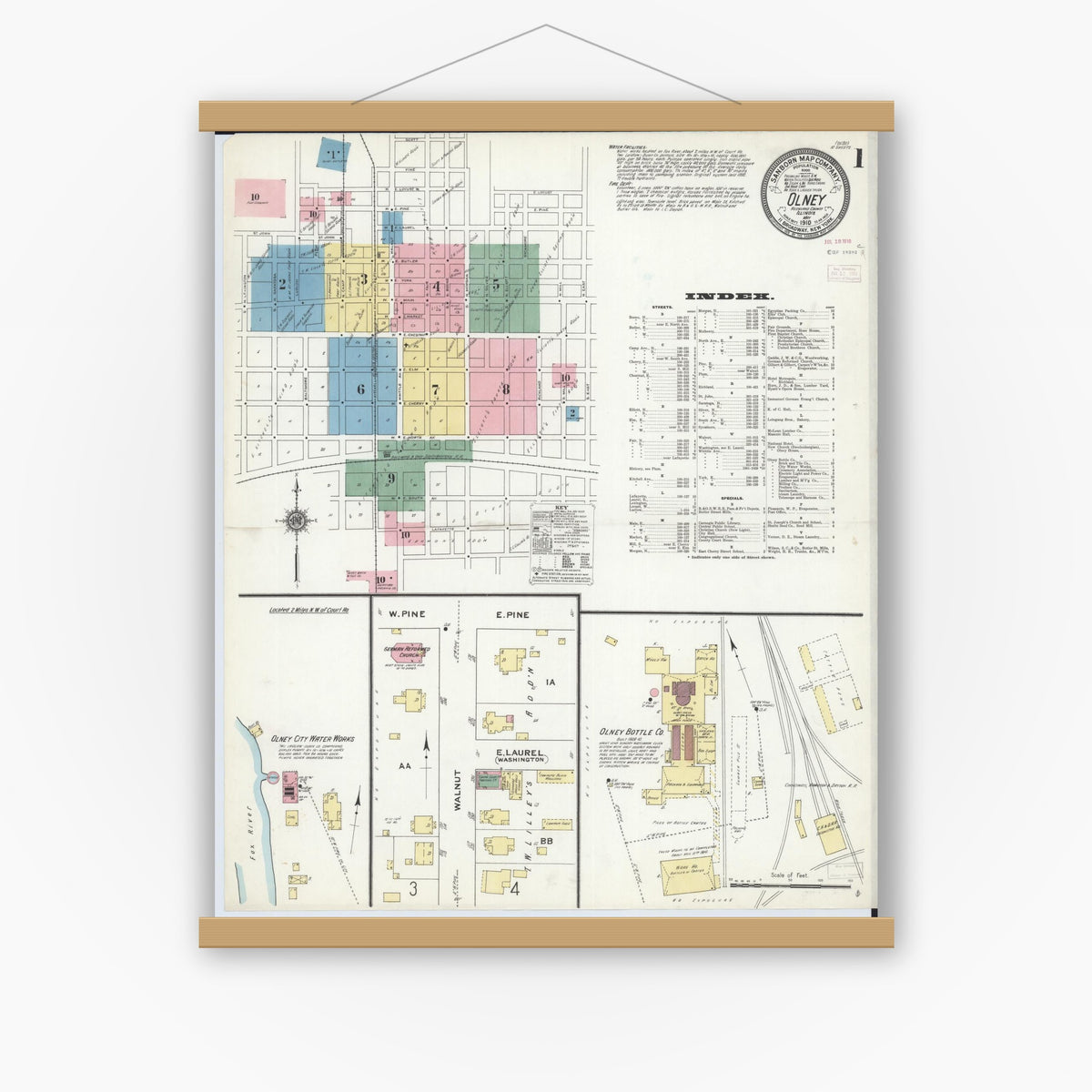 Old map wall art mockup — magnetic wood frame on white wall — Sanborn Fire Insurance Map from Olney, Richland County, Illinois (1910) - Complete Map Set