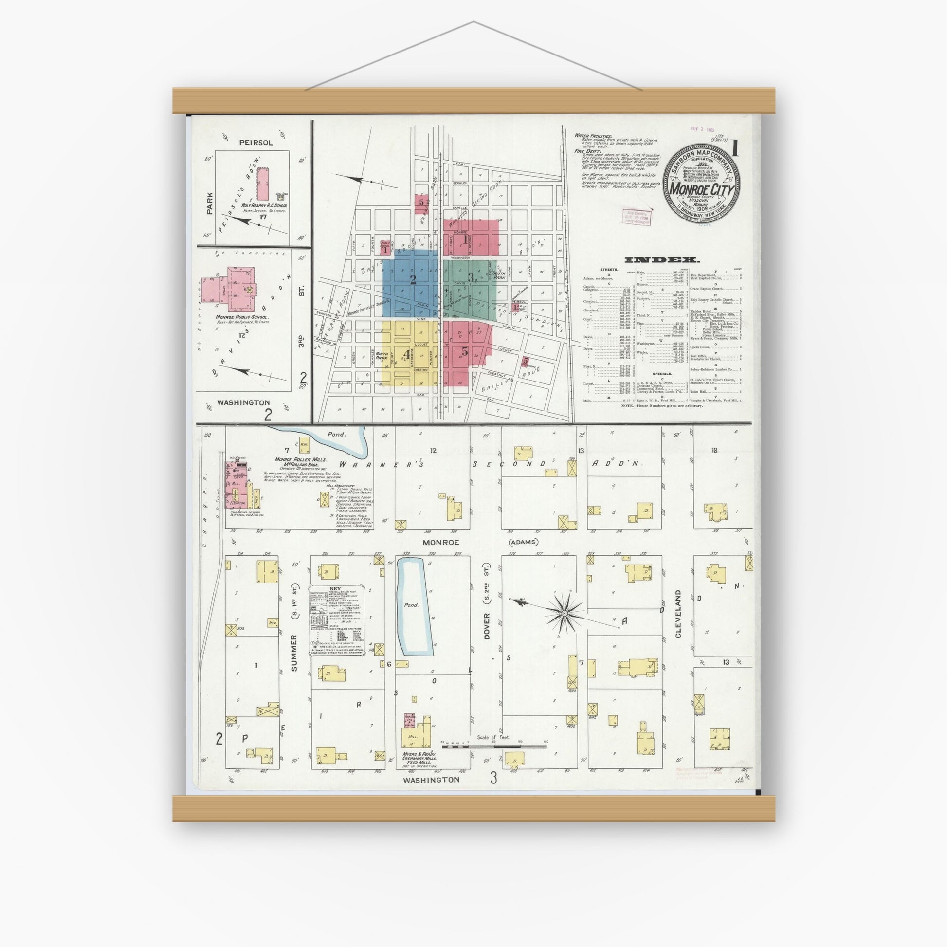 Old map wall art mockup — magnetic wood frame on white wall — Sanborn Fire Insurance Map from Monroe City, Monroe County, Missouri (1909) - Complete Map Set