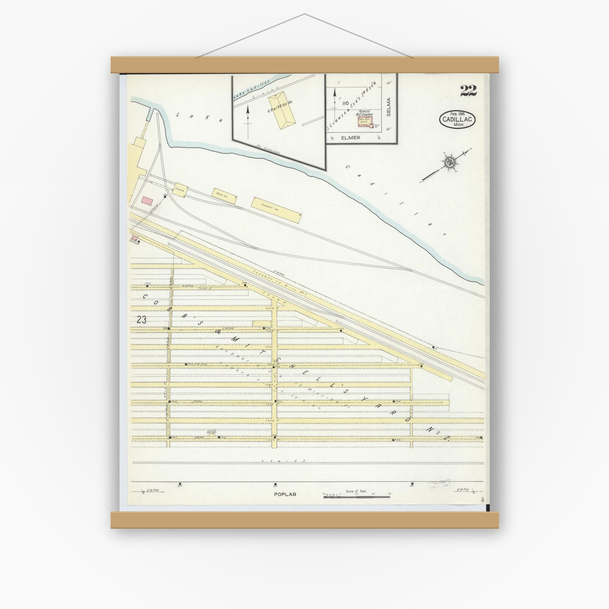 Old map wall art mockup — magnetic wood frame on white wall — Sanborn Fire Insurance Map from Cadillac, Wexford County, Michigan (1914), Sheet #0022