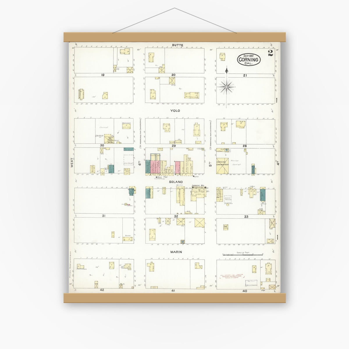 Old map wall art mockup — magnetic wood frame on white wall — Sanborn Fire Insurance Map from Corning, Tehama County, California (1897), Sheet #0002