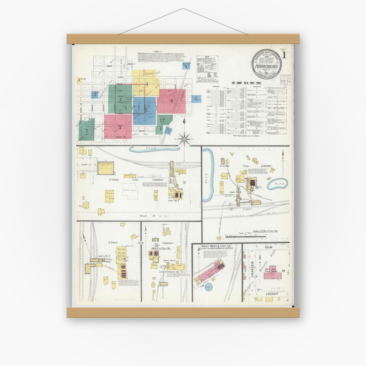 Old map wall art mockup — magnetic wood frame on white wall — Sanborn Fire Insurance Map from Harrisburg, Saline County, Illinois (1907) - Complete Map Set